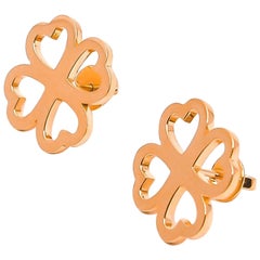 Orecchini a perno con fiore di cuore in oro rosa 18 carati