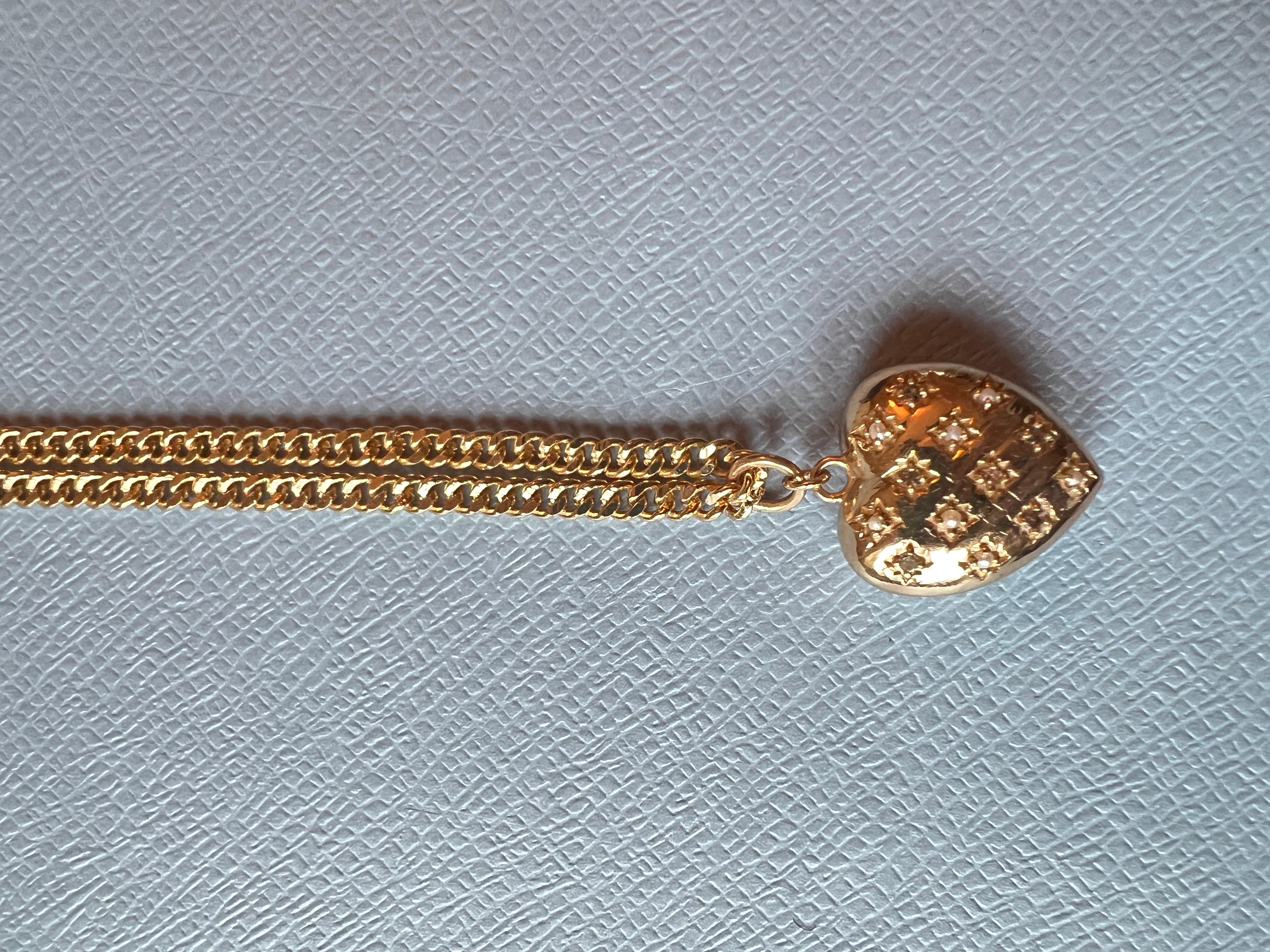 Heart Chain Necklace White Diamond White Pearl Victorian Style Puffy Heart

Designer: J DAUPHIN

Length: 28 inches 

White diamonds hold significant spiritual meaning by embodying purity, clarity, and enlightenment. They are believed to amplify the