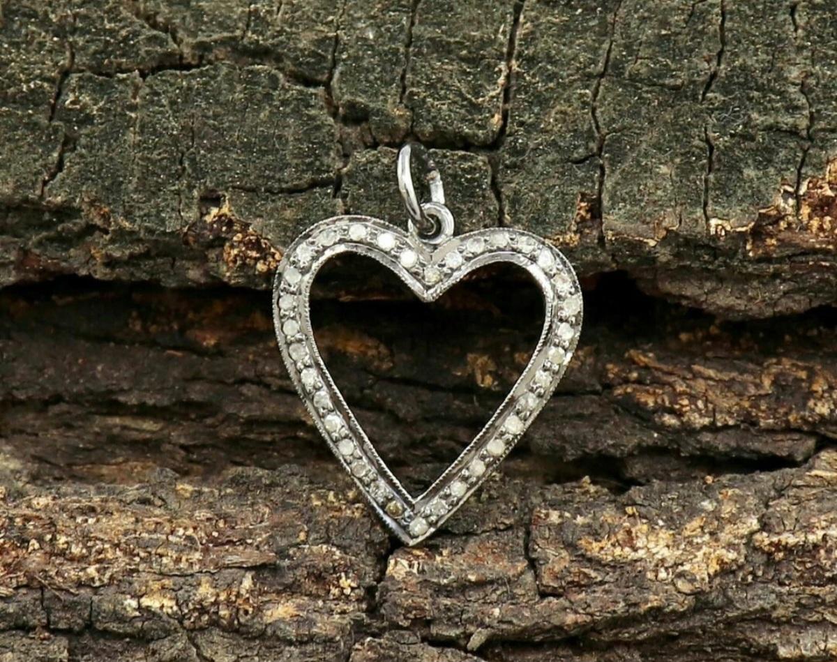 Heart Charm Pendant Pave Diamond 925 Silver Minimalist Pendant Birthday Gift.

Base Metal
Sterling Silver, 925 parts per 1000
Cut
Good
Diamond Weight
0.50 Cts Approx
Metal
Sterling Silver
Main Stone Shape
Round
Size
19x25mm Approx
Main