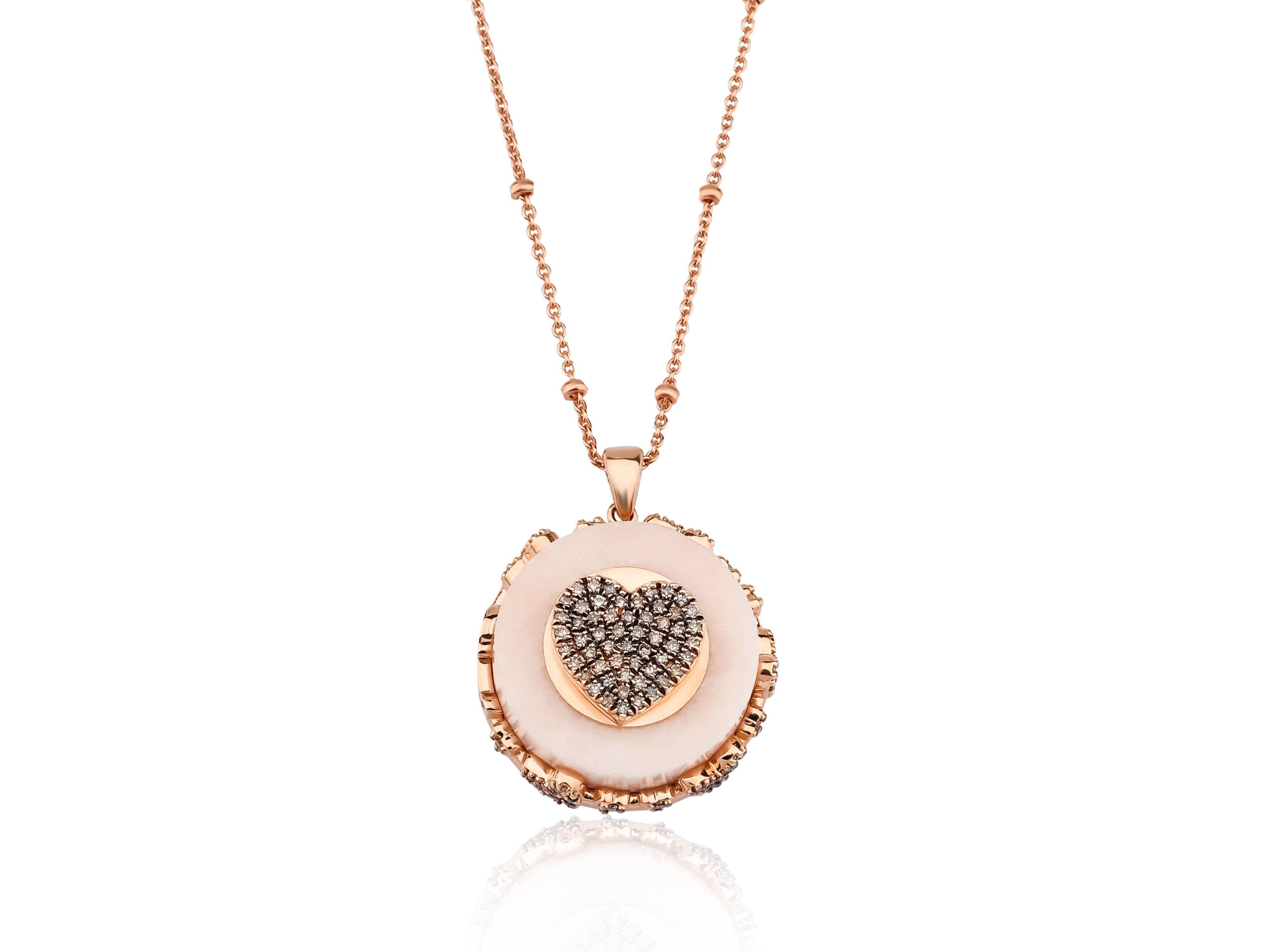 This wonderful heart charm marble necklace from our Fumul Marble collection shows in every detail a very complicated yet perfectly done workmanship. The pendant and the chain are in 14-carat rose gold with pink marble stones. The necklace weighs