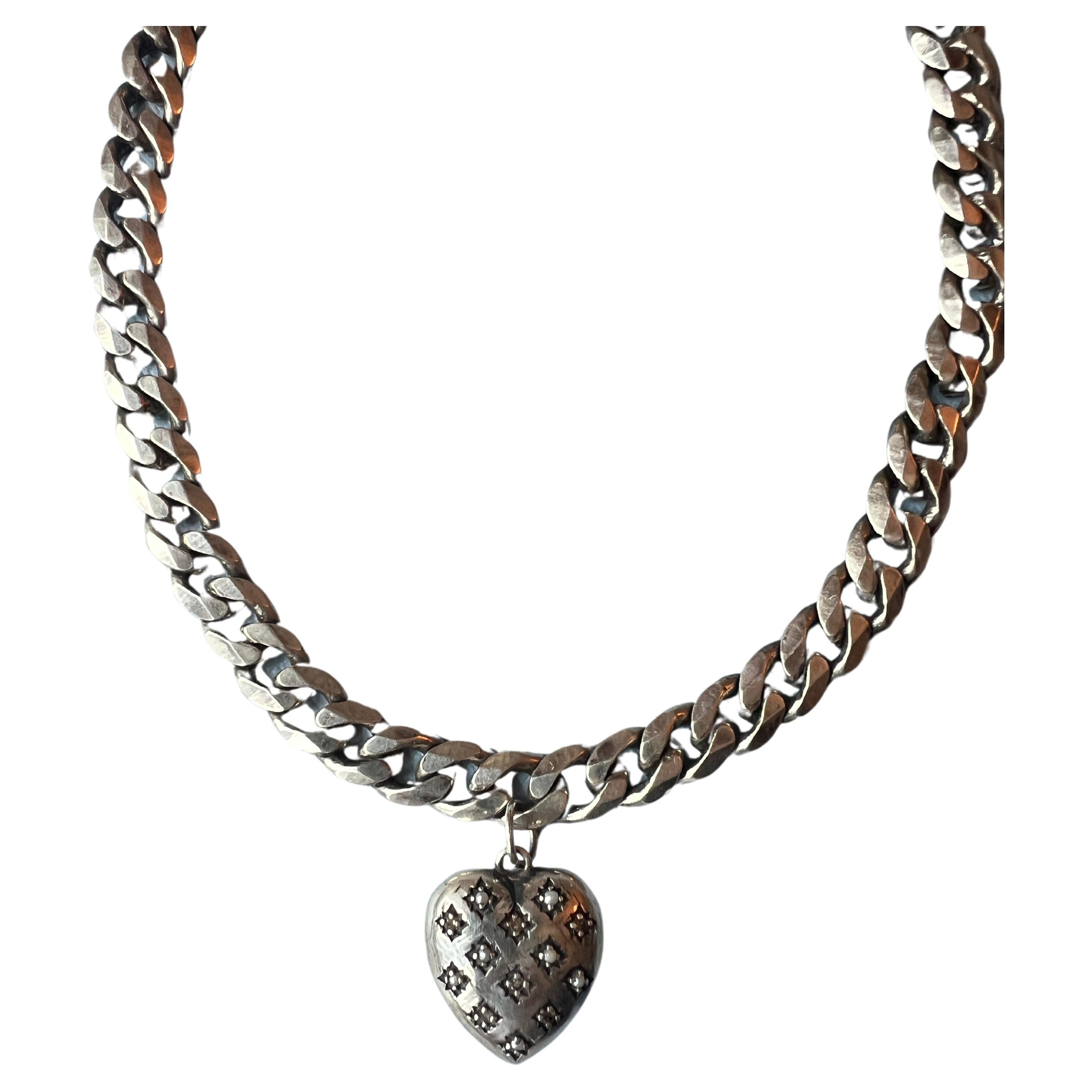 Heart Choker Necklace Silver White Diamond

Solid Silver White Diamond Pearl Heart

Chain: Solid Sterling Silver
Heart: Solid Sterling Silver

Designer: J DAUPHIN

Length: 16 inches 

White diamonds hold significant spiritual meaning by embodying