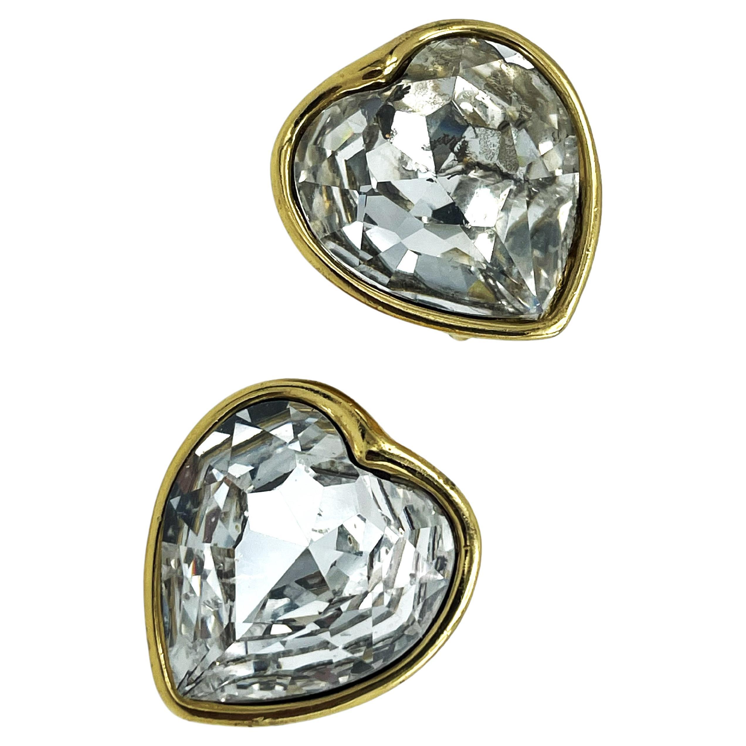 YVES SAINT LAURENT (MADE IN FRANCE) HEART CLIP-ON EARRING. Truly magnificent, fabulous and over sized 'HEART' earring. consisting of a large cut rhinestone heart. 

Measurement
Width 3.1cm
Height 3.3 cm
Deep 1.4cm