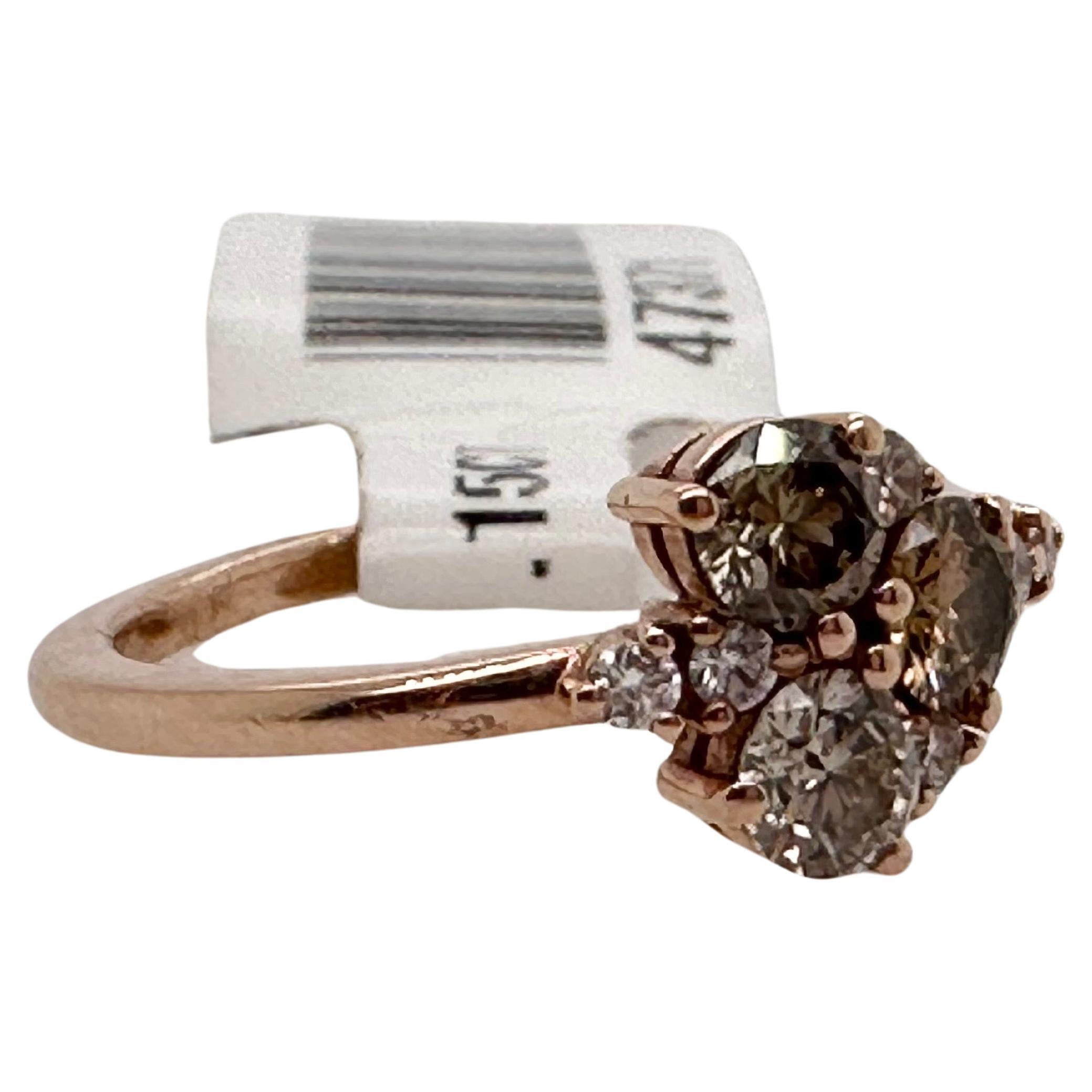 Beautiful cluster ring made into a heart shape with natural brown and champagne color diamonds in 14KT rose gold.

Metal Type: 14KT


Natural Diamond(s): 
Color: F-G, Fancy Brown, Fancy Yellow Brown
Cut:Round Brilliant
Carat: 0.70ct
Clarity: VS-SI