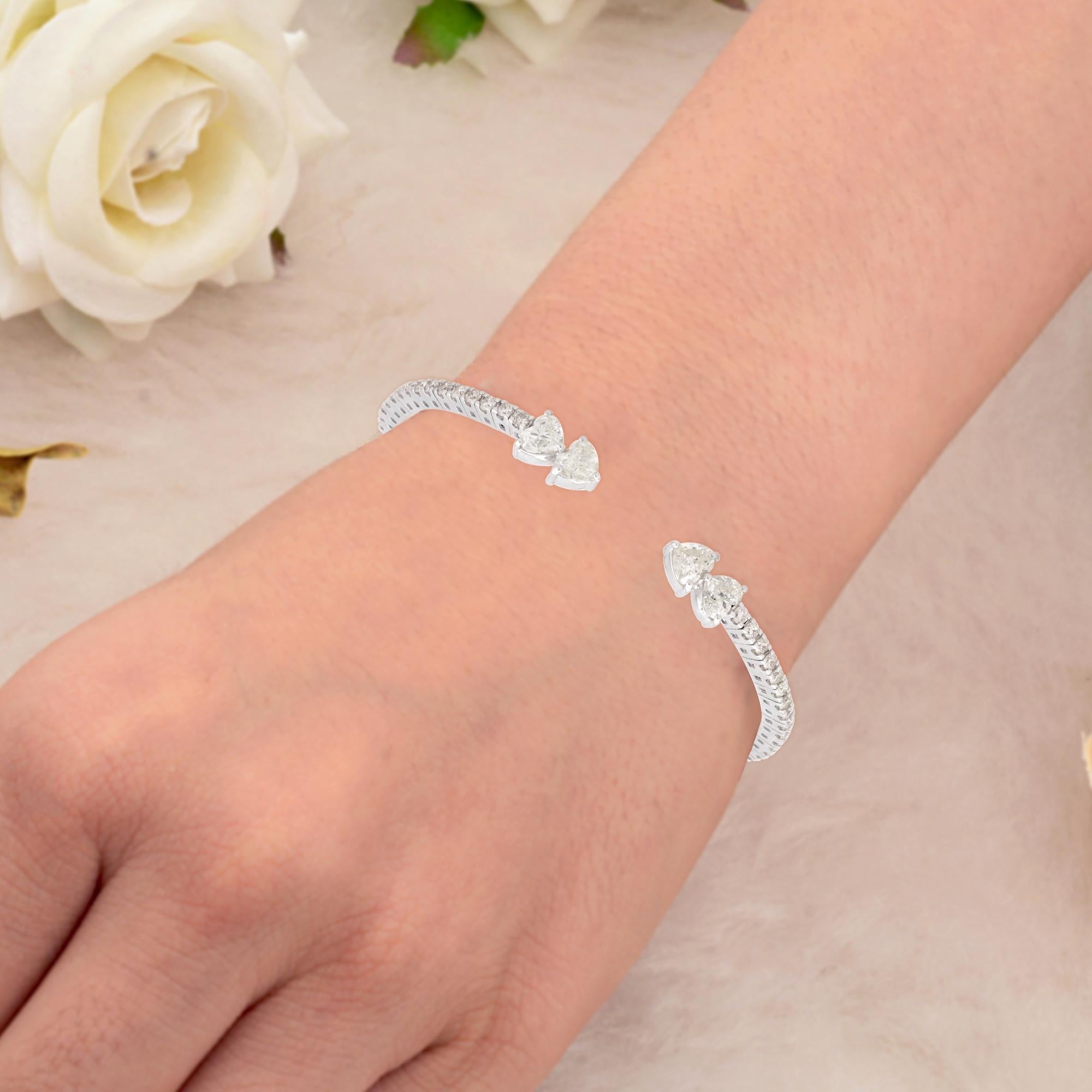 Heart Cut 2.80Ct Natural Diamond Open Cuff Bangle Bracelet In 14K White Gold.
Diamonds are a universal symbol of eternity, strength, and elegance a perfect gift to commemorate milestones or celebrate personal achievements. With brilliant sparkle and