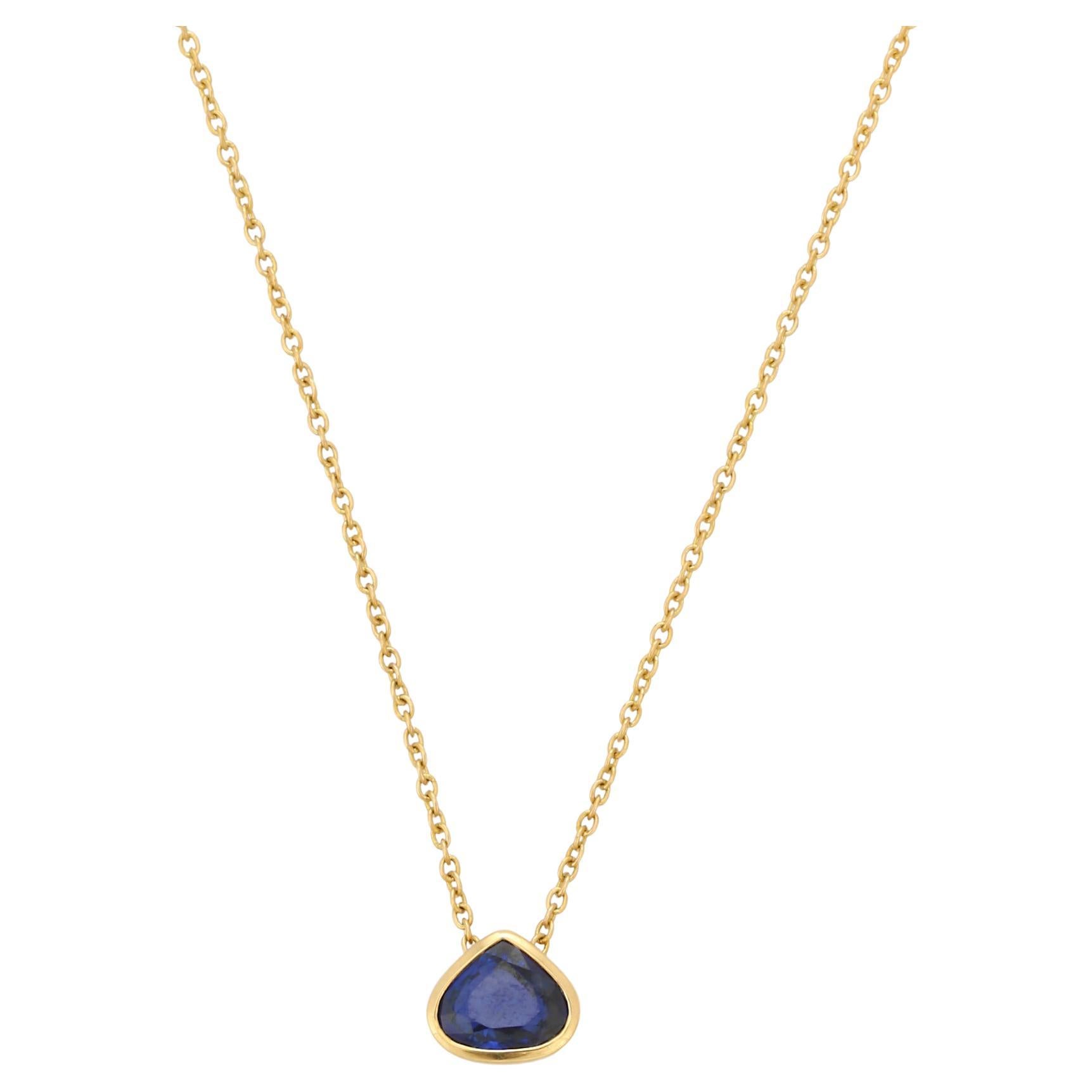 Pear Cut Blue Sapphire Pendant Necklace with Chain in 18K Yellow Gold  For Sale