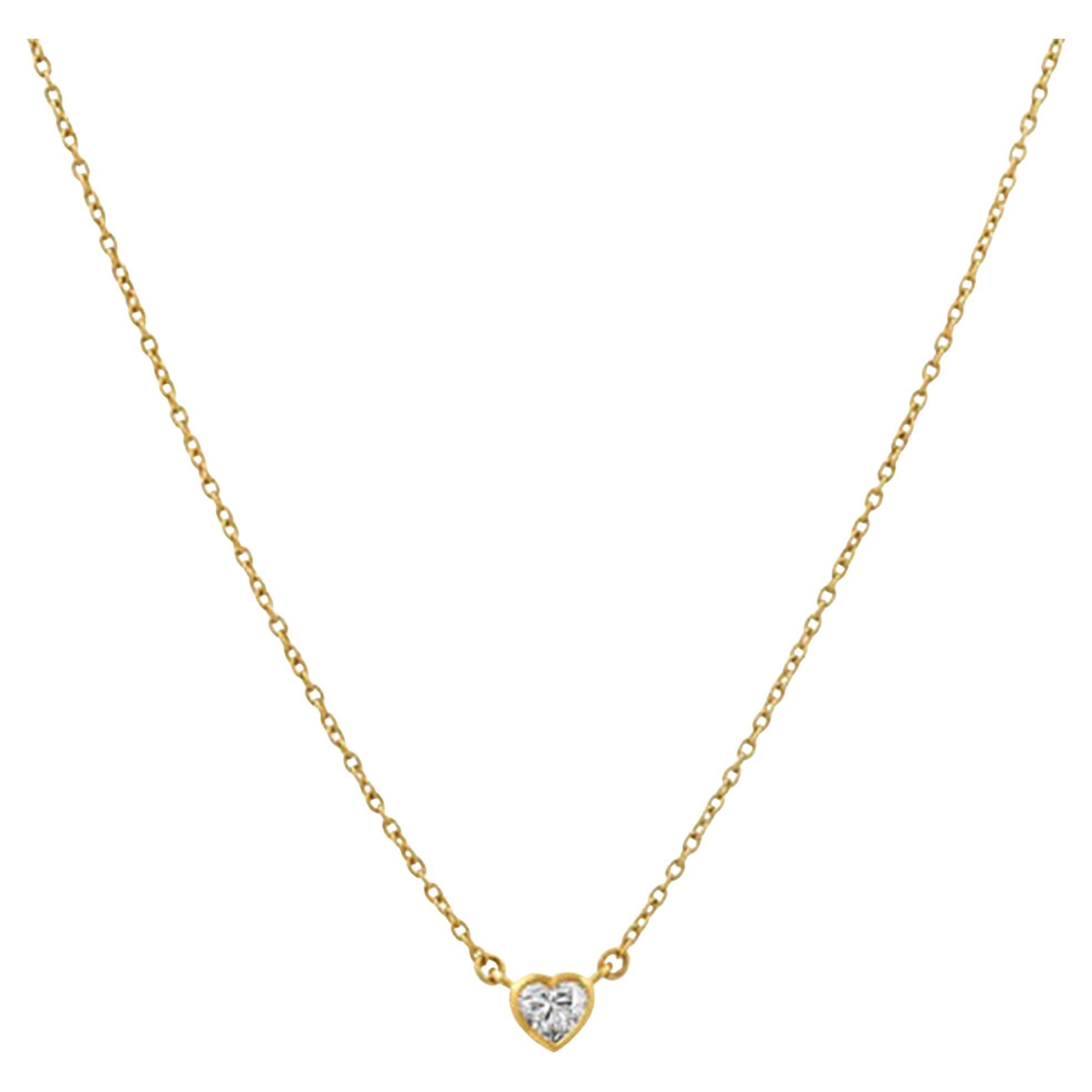 Collier avec pendentif en forme de cœur en or jaune 14 carats serti d'un diamant « Fancy » de 0,20 ct