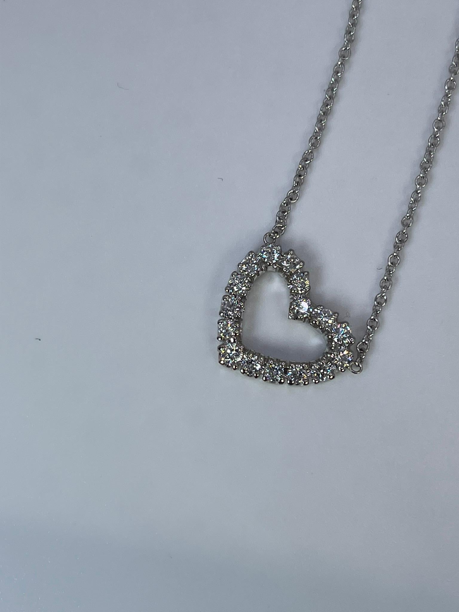 Large heart pendant necklace made with natural diamonds in 14KT gold.

GRAM WEIGHT: 5.17gr
GOLD: 14KT white gold
NECKLACE-18