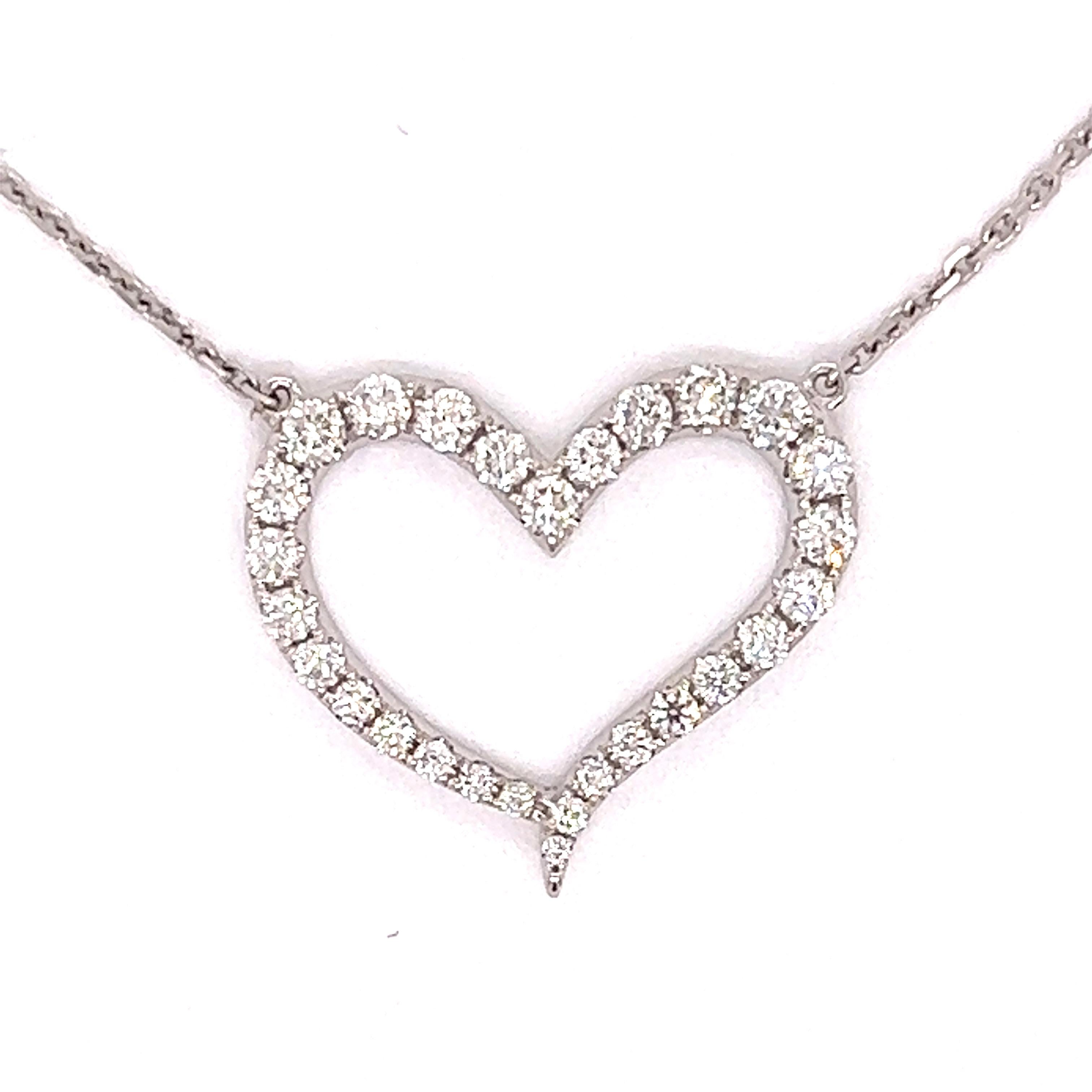 Beautiful and classic heart diamond necklace.  There are 28 diamonds with  .74 cttw.  These diamonds are of SI clarity and H-I color.  This is 4 grams of 18kt white gold.  The heart is stationary and does not slide.  This necklace is 18