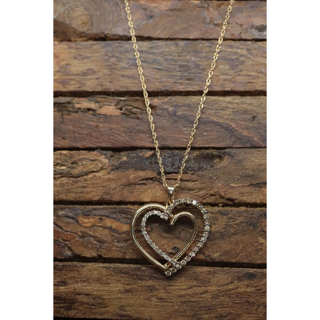 Pendentif en forme de cœur avec double cœur ouvert de 14 carats et pavé de 0,80 carat. en vente 4