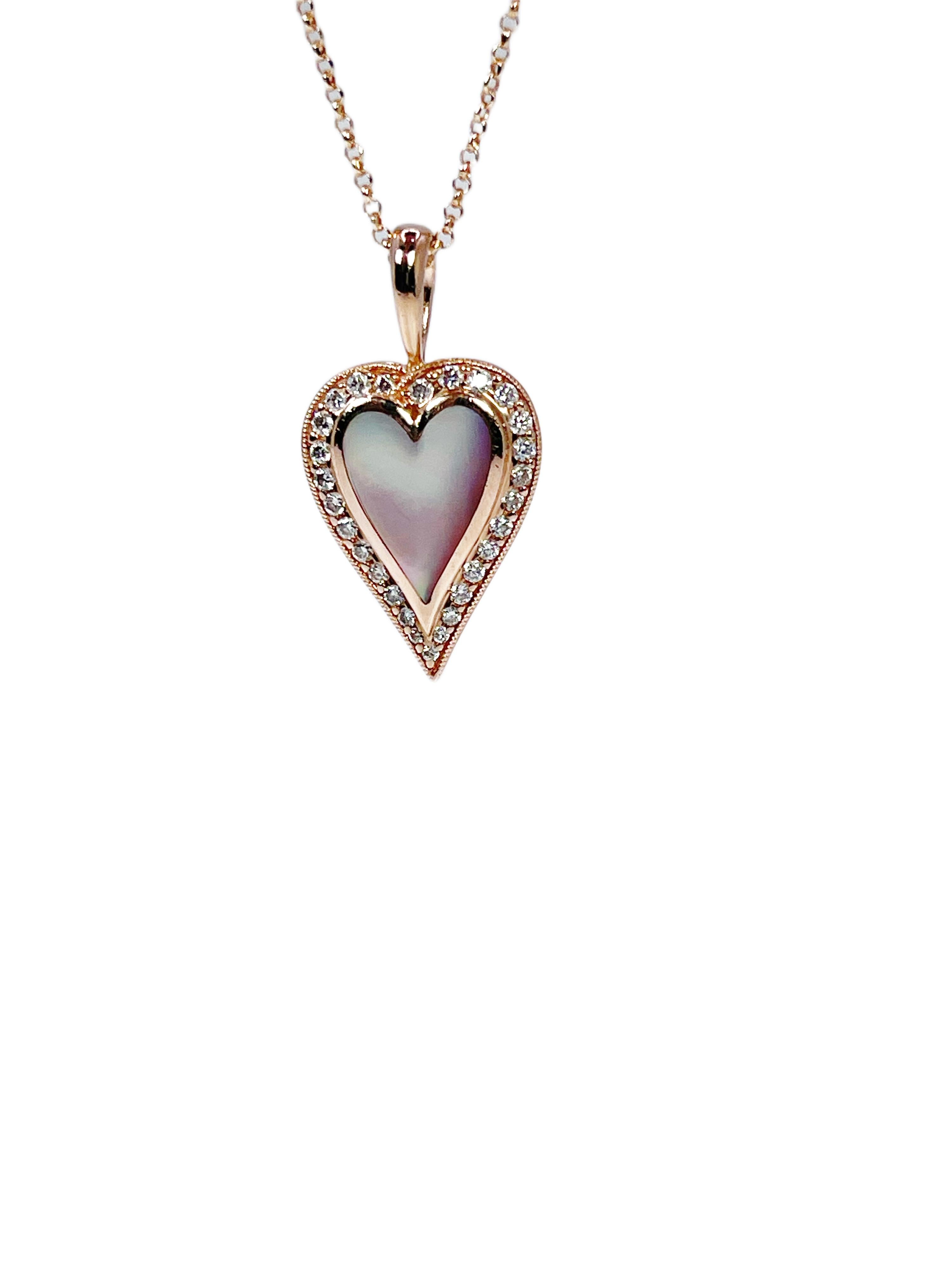 Kabana Designer heart pendant necklace made with VS diamonds in 14KT rose gold, center is mother of pearl.

GRAM WEIGHT: 4.51gr
GOLD: 14KT rose gold
SIZE: PENDANT (1INCHES LONG) NECKLACE-18