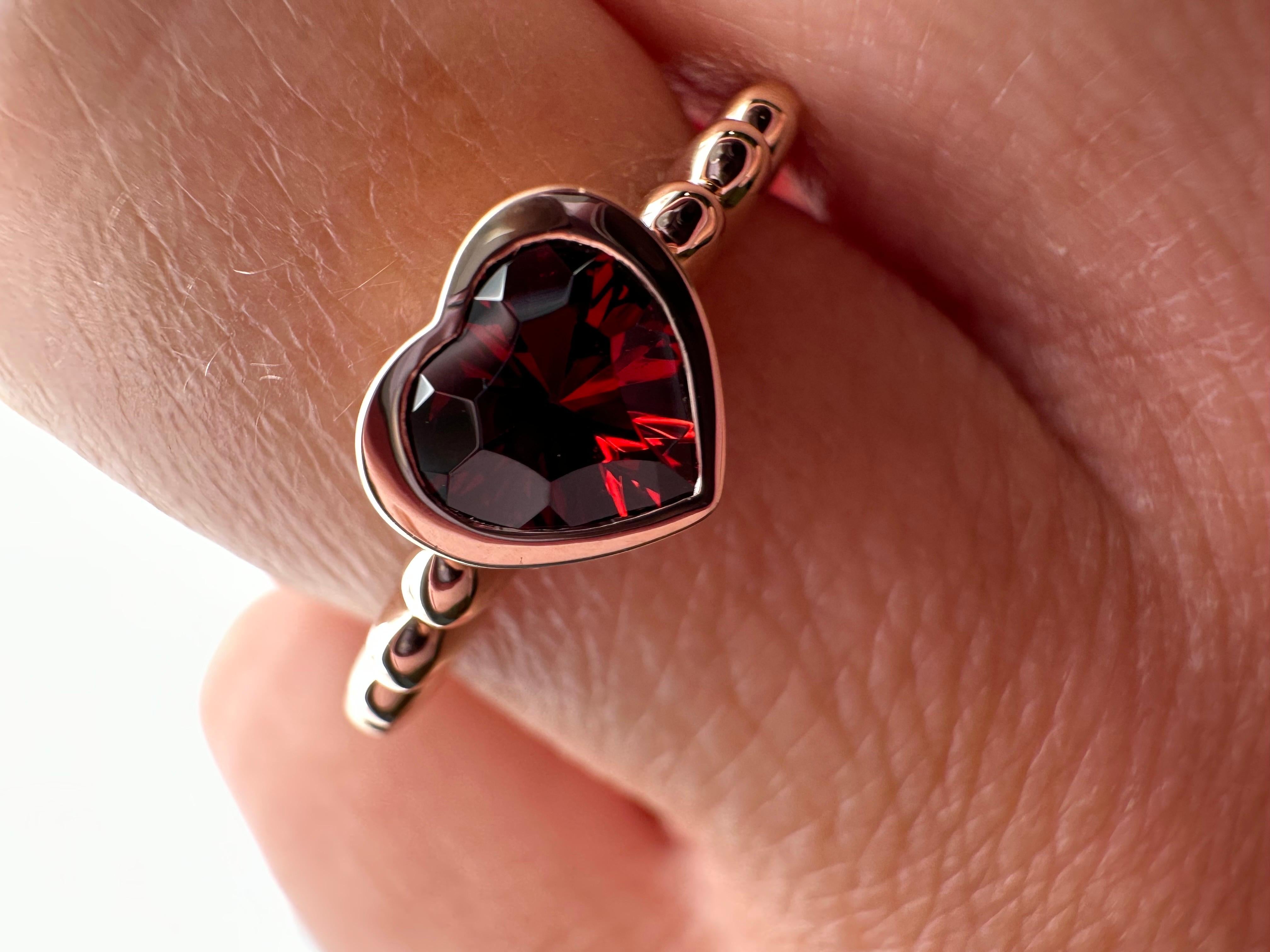One of the most romantic rings you would come across, looks so gentle and loving but at same time very sterdy and well made. The ring is a size 7.5 but can be resized. The garnet is natural fancy cut into a heart shape and originating from Czech