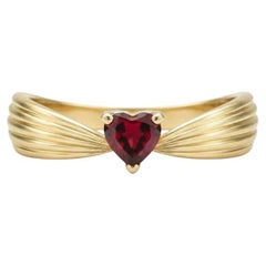 Heart garnet ring in 14k gold