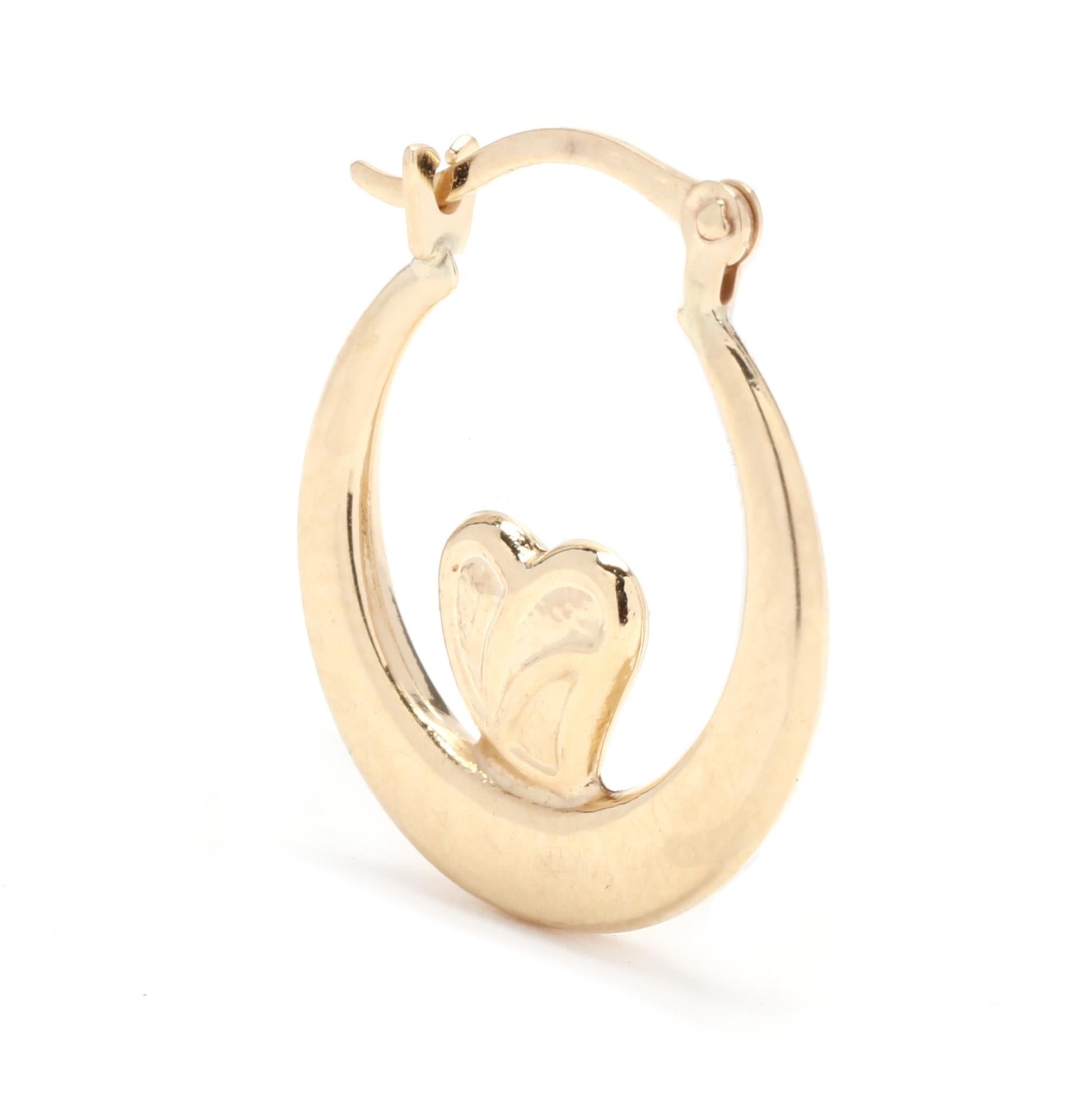A pair of vintage 14 karat yellow gold heart huggie hoop earrings. These simple hoops feature a flat tapered hoop with heart motif in the center and pierced latch back closures.

Length: 5/8 in.

Weight: .50 dwts. / .78 grams

Stamps: 14K


Ring