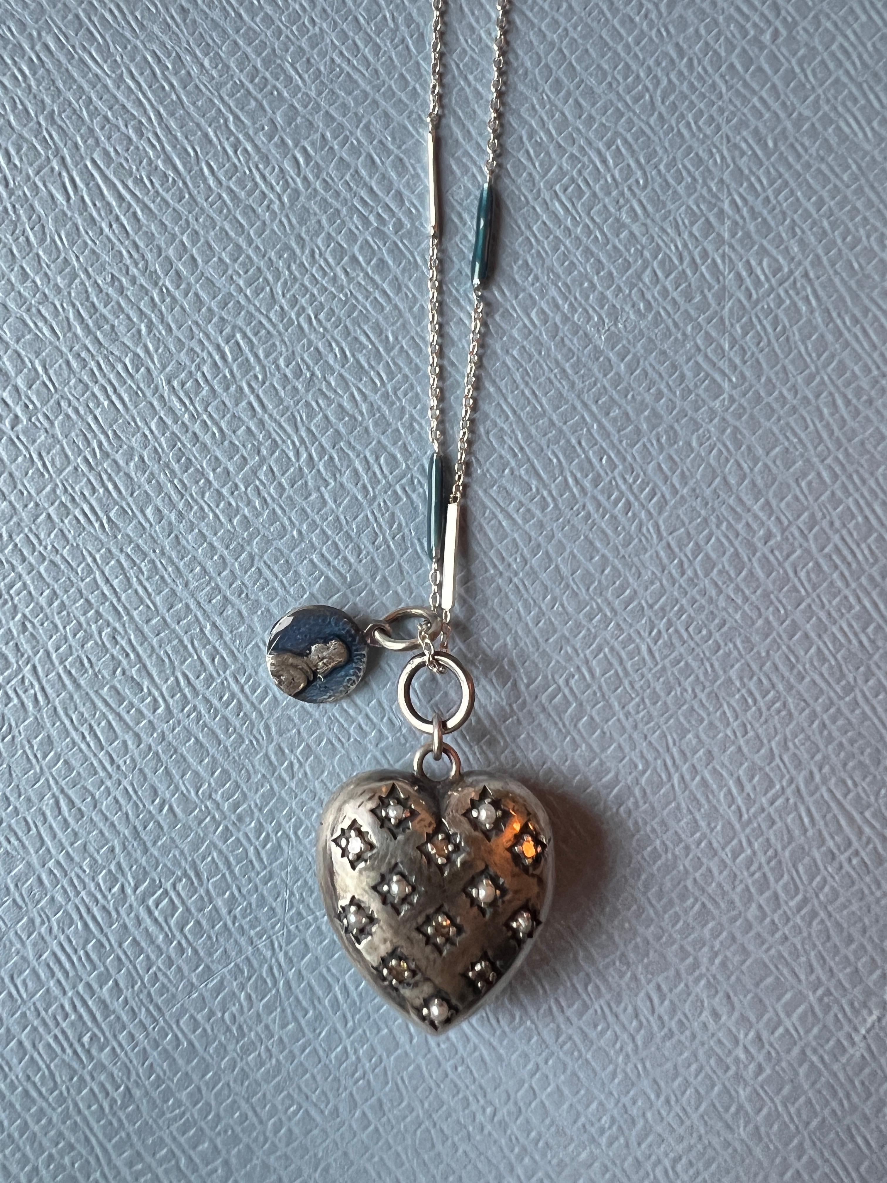 Heart Chain Necklace Silver Joan of Arc Blue Enamel White Diamond Pearl 

Chain: Solid Sterling Silver with blue hand painted Enamel
Heart: Solid Sterling Silver with Diamonds and mini pearls

Designer: J DAUPHIN

Length: 28 inches 

White diamonds