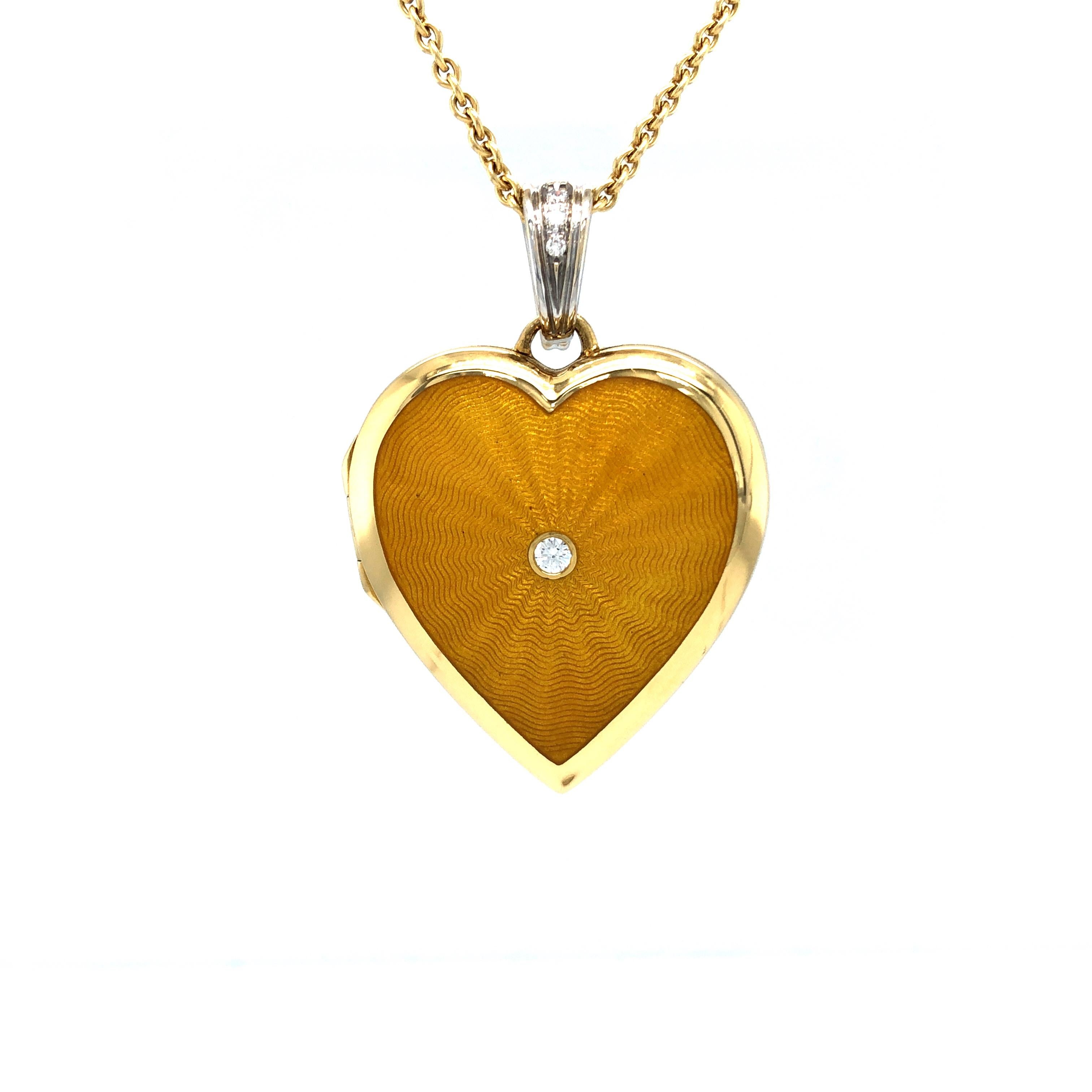 Victor Mayer heart shaped locket pendant necklace 18k yellow gold and white gold, Hallmark collection, yellow vitreous enamel, 4 diamonds 0.8 ct, H VS, brilliant cut

About the creator Victor Mayer
Victor Mayer is internationally renowned for