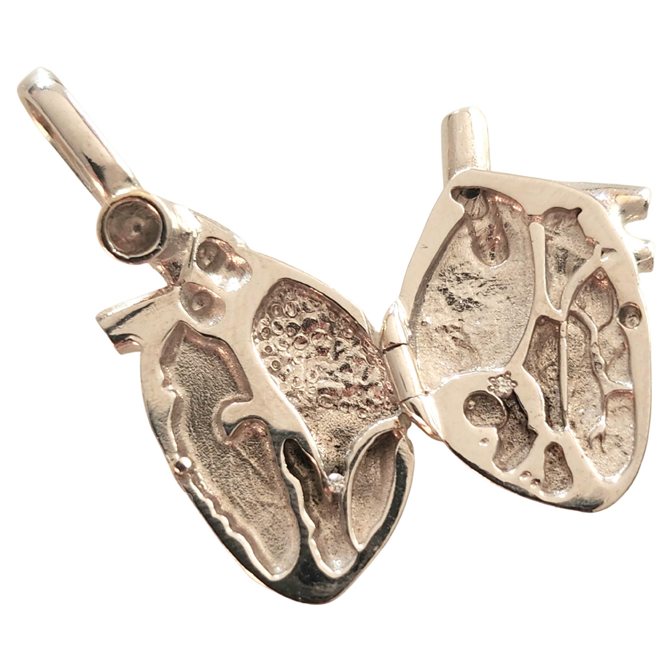 Unique Organic heart designe in 18k white gold locket pendant with total gold weight of 12.50 18k gold finest and 3.5cm lenght made in italy hall marked 750k 
