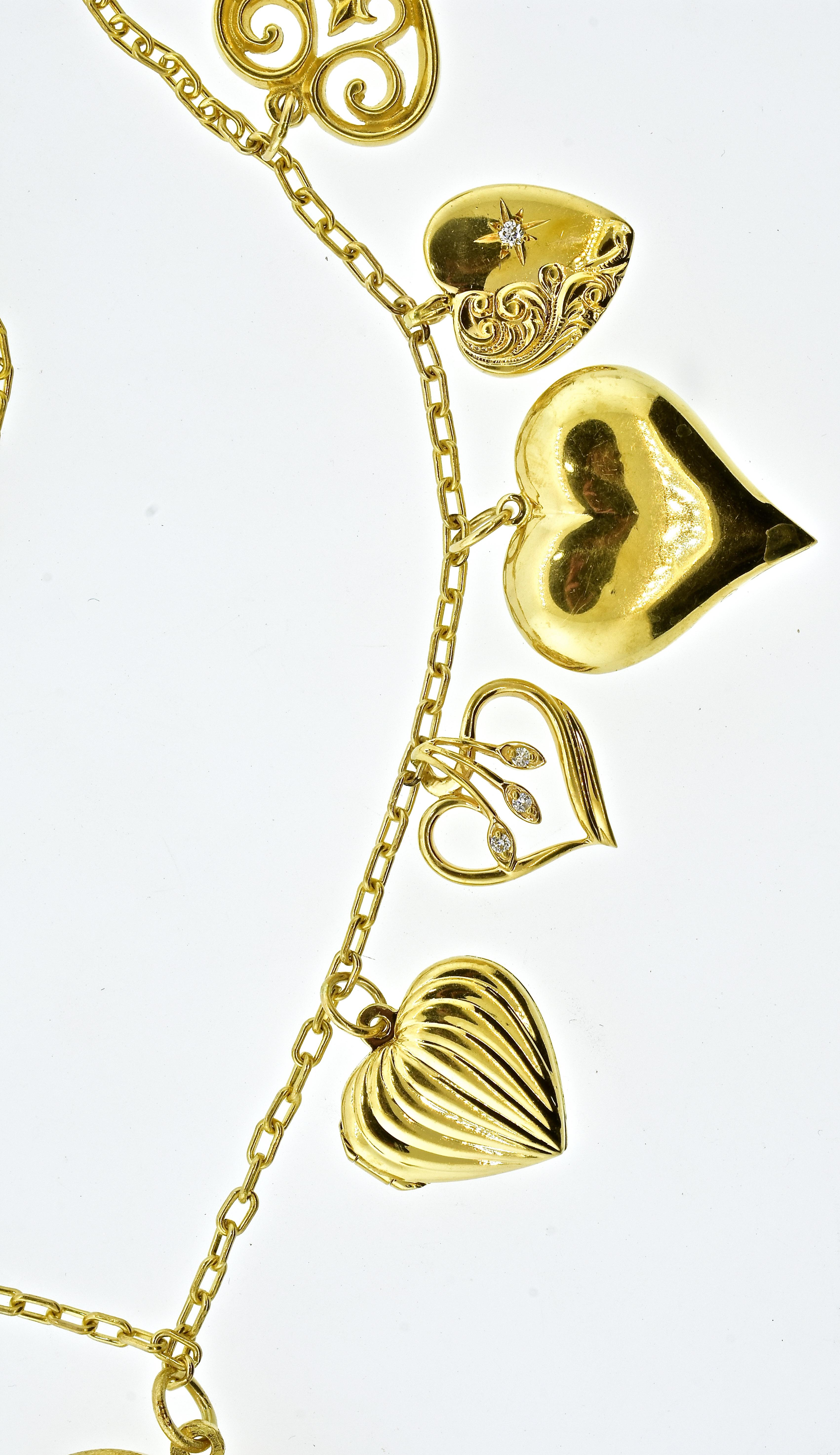 Contemporary Heart Motif Gold and Diamond Dangling Necklace, circa 1960