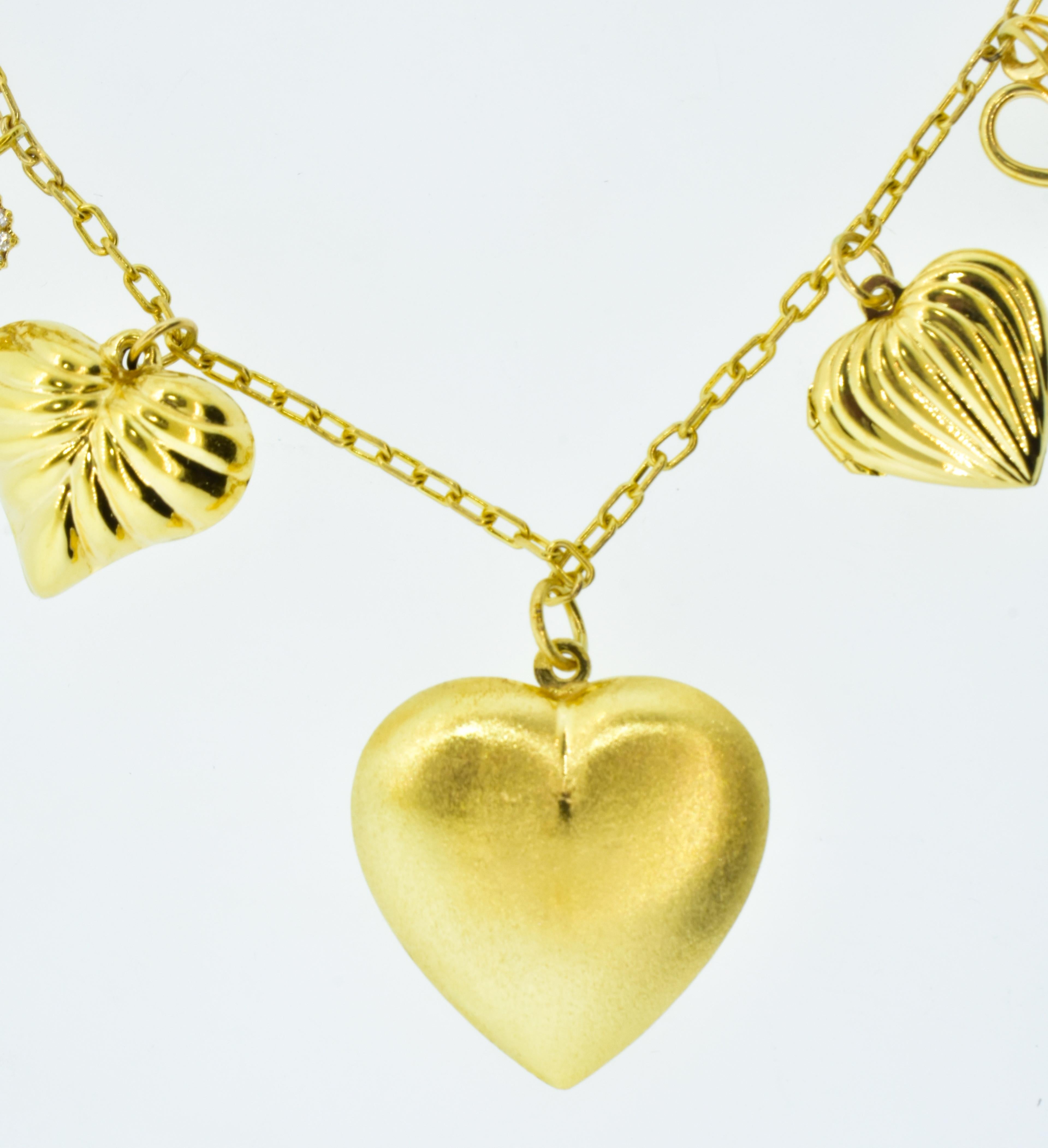 Brilliant Cut Heart Motif Gold and Diamond Dangling Necklace, circa 1960