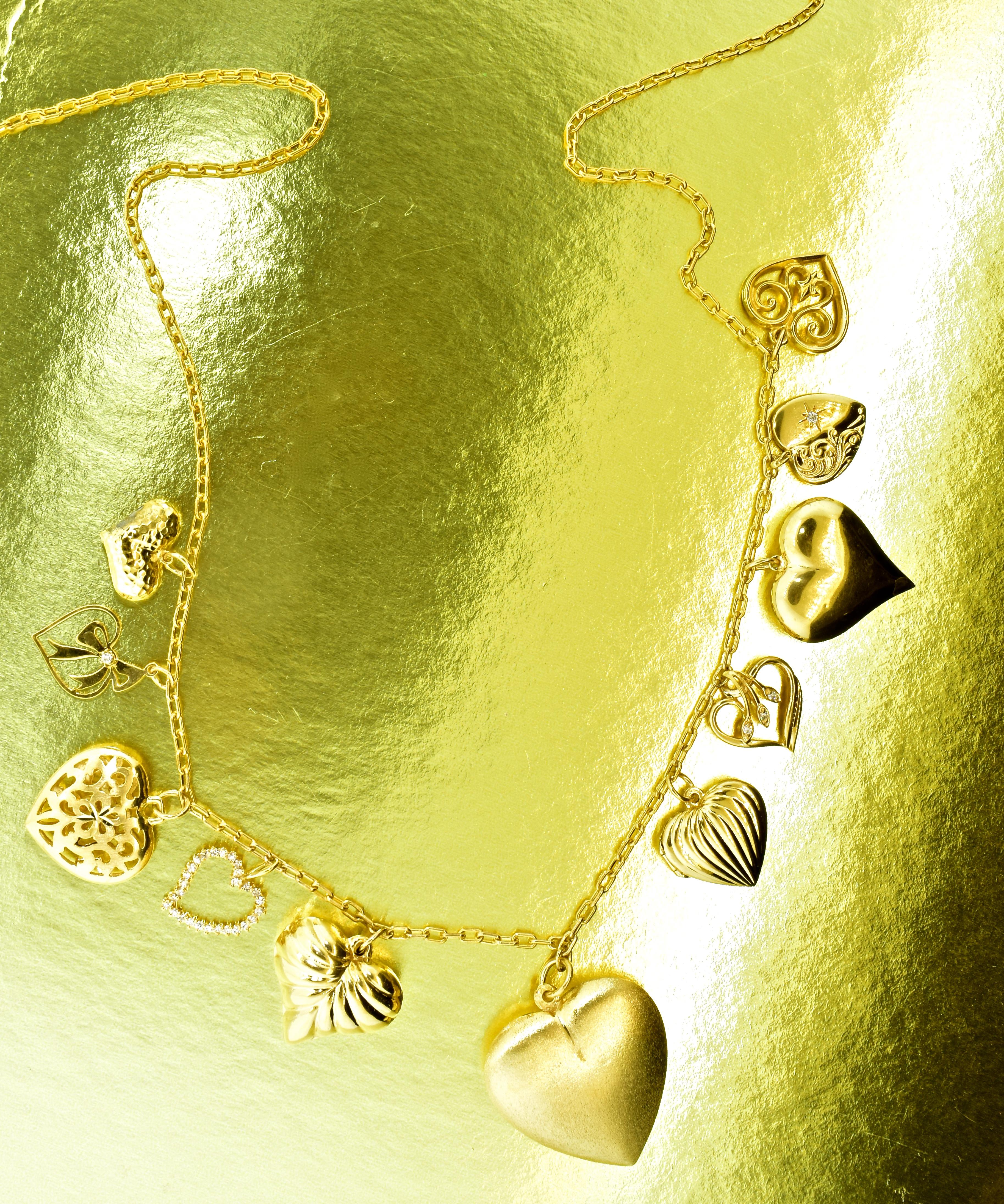 Women's or Men's Heart Motif Gold and Diamond Dangling Necklace, circa 1960