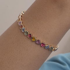 Bracelet de tennis en or jaune 14kt avec cœur en saphir multiple 7".
