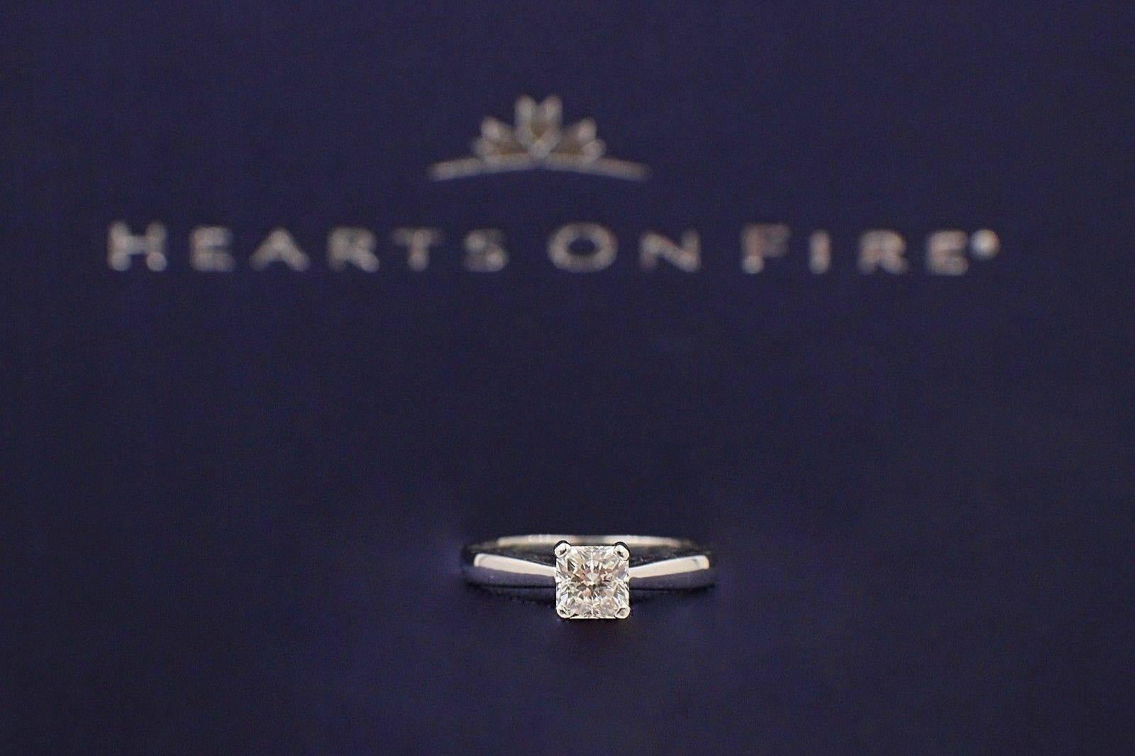 Brand:  HEARTS ON FIRE
Style:  DREAM SOLITAIRE
Serial Number:  DRM8442
Year Purchased:  2007
Metal:  PLATINUM PT950
Total Carat Weight:  0.648 CT
Diamond Shape:  SQUARE BRILLIANT DREAM
Diamond Color:  H
Diamond Clarity:  SI1
Hallmark:  HOF