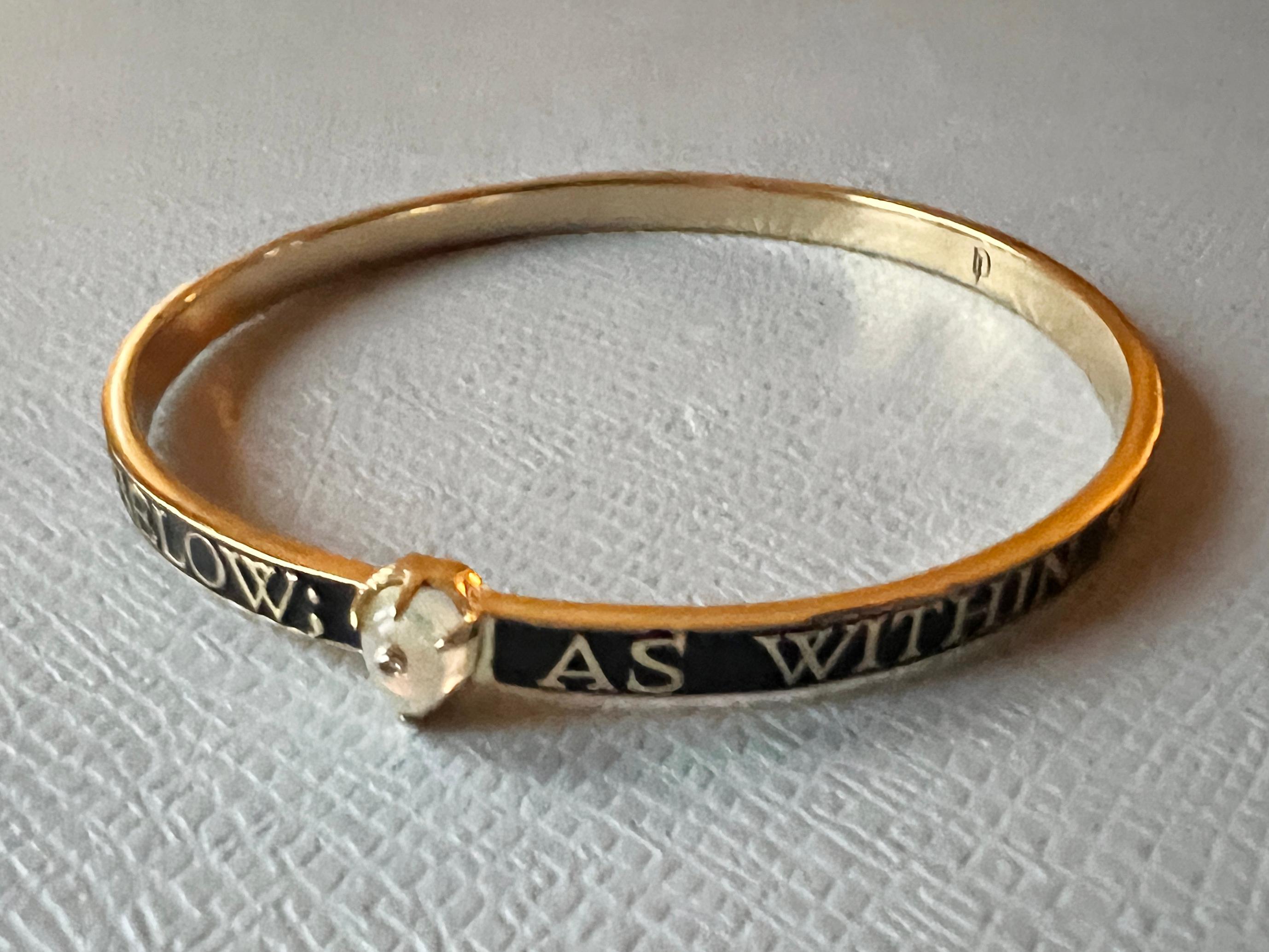 Opal Diamond Bangle Bracelet Spiritual Black Enamel 
Victorian Style Hermetica 

Inspired by Hermetica and Cabbalistic concepts of the micro and macro cosmos. 

Gold plated Brass with Black Enamel

Designer J Dauphin

The bracelet is made with the