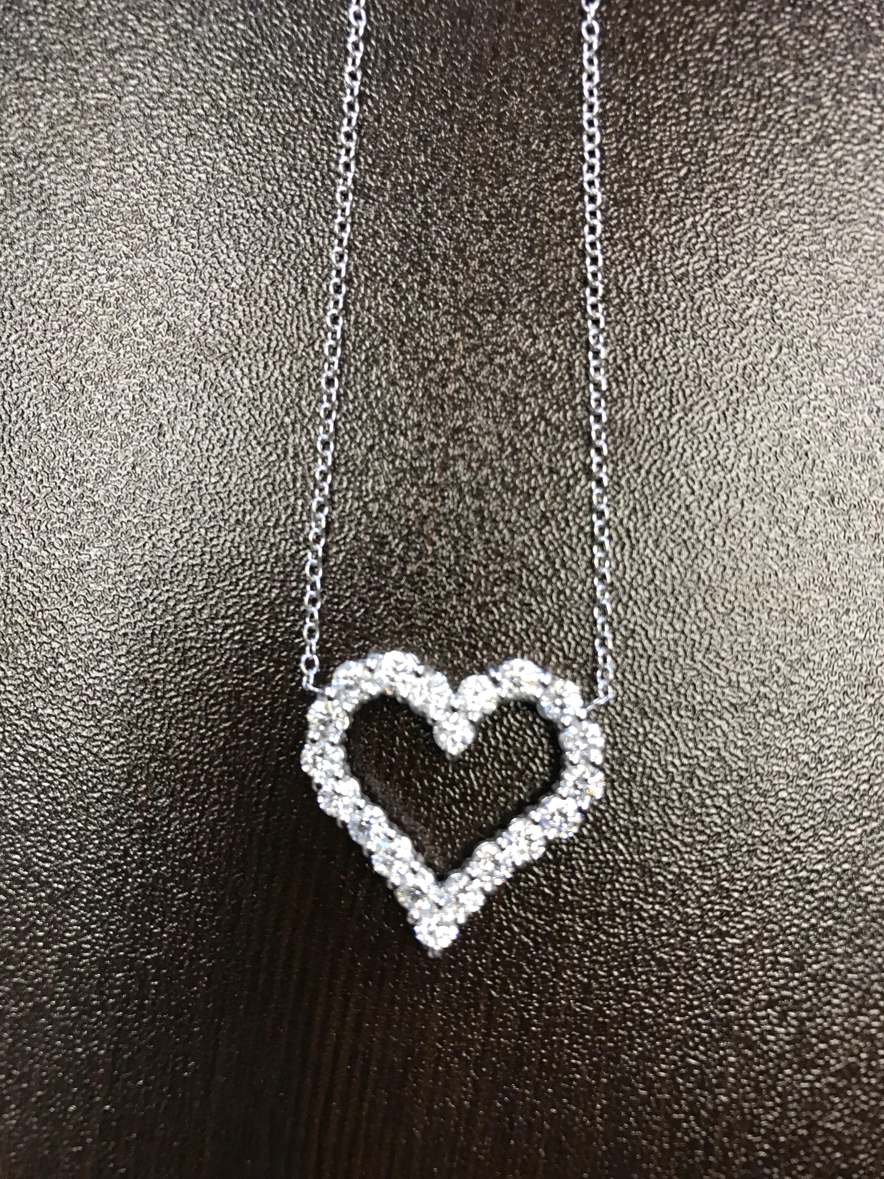 Tiffany style heart pendant set in 14K white gold. The stones are set with 0.10 carats each. The color is G. Clarity is SI. Total weight of pendant is 2.00 carats. Price of the heart is $3,500.