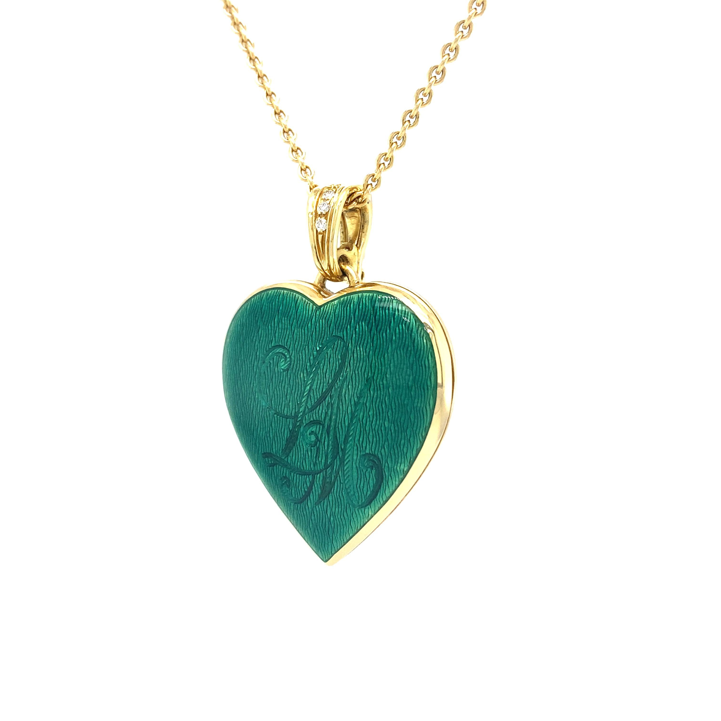 Victor Mayer heart pendant locket, 18k yellow gold, emerald greeen vitreous enamel, guilloche engraving and hand engraving of the letters >LM<, 3 diamonds, total 0.03 ct, G VS brilliant cut

About the creator Victor Mayer
Victor Mayer is