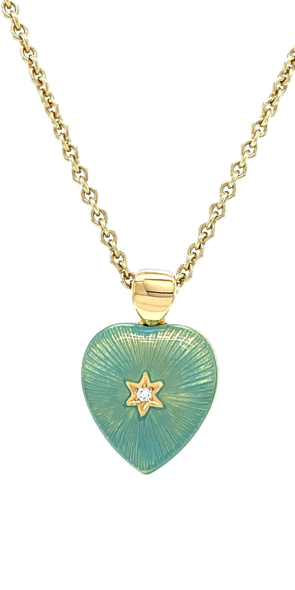 Victor Mayer heart shaped two colored pendant necklace 18k yellow gold, light turquoise and yellow vitreous enamel, 2 diamonds, total 2.02 ct, G VS, measurements app. 11.8 mm x 13.0 mm

About the creator Victor Mayer
Victor Mayer is internationally