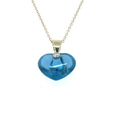 Heart Pendant Sky Blue Topaz 13 Carats with natural Diamond 14KYG