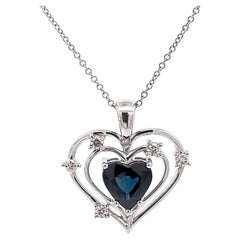 Heart Pendant with Heart Cut Sapphire and Diamonds in White Gold