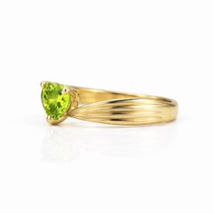 Heart peridot ring in 14k gold