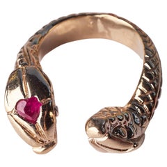 Bague cocktail en forme de cœur en rubis et serpent J Dauphin en bronze