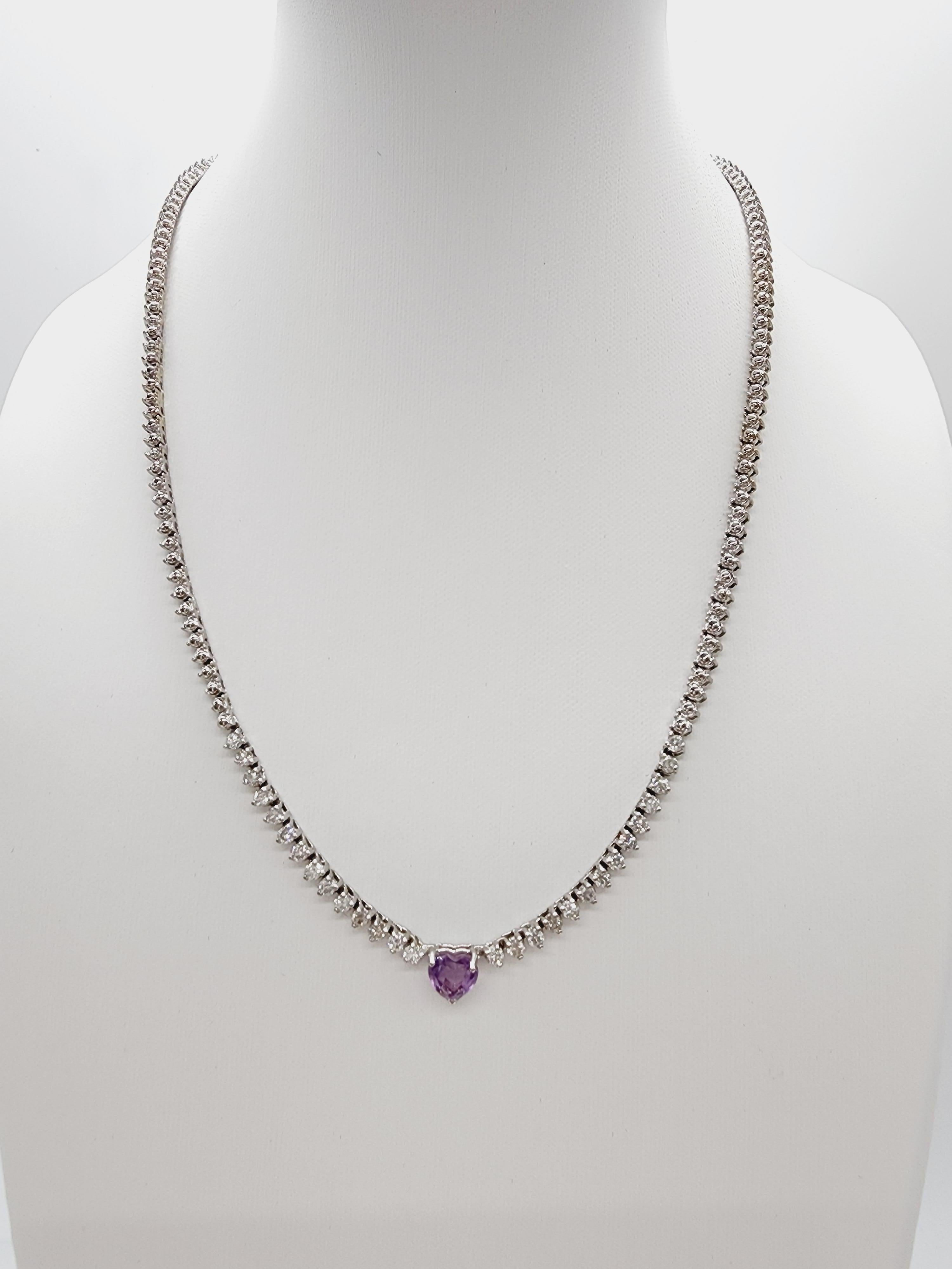 Heart Shape Amethyst Natural Diamond Necklace 14 Karat White Gold Round Brilliant Cut Diamond set on 3 prong setting.  The closure is an insert clasp with safety clasp. Length is 16 inches. Elegance you can wear.

Center Amethyst weight: 0.82