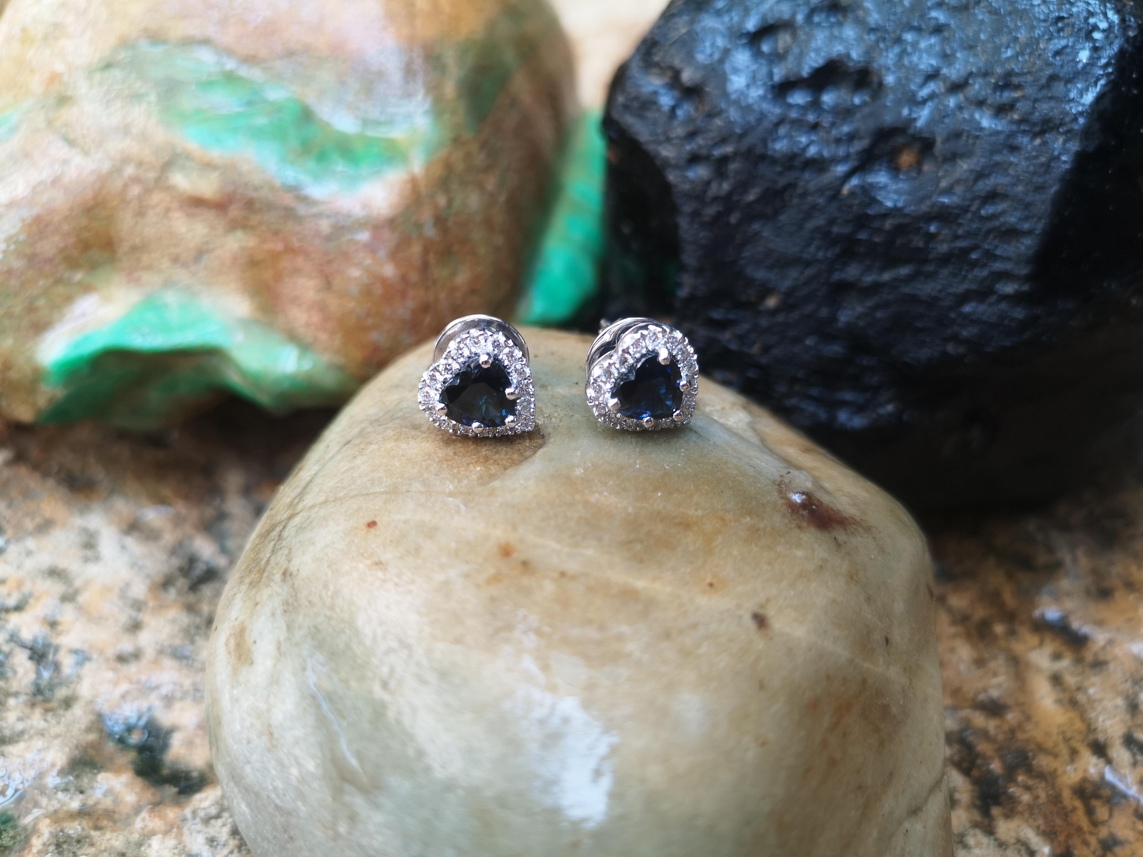 Blue Sapphire 3.33 carats with Diamond 0.41 carat Earrings set in 18 Karat White Gold Settings

Width: 1.1 cm
Length: 1.1 cm 

