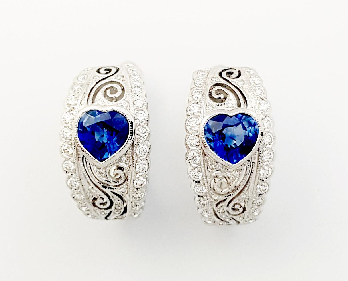 Blue Sapphire 1.98 carats with Diamond 0.48 carat Earrings set in 18K White Gold Settings

Width: 0.9 cm 
Length: 1.7 cm
Total Weight: 6.59 grams

