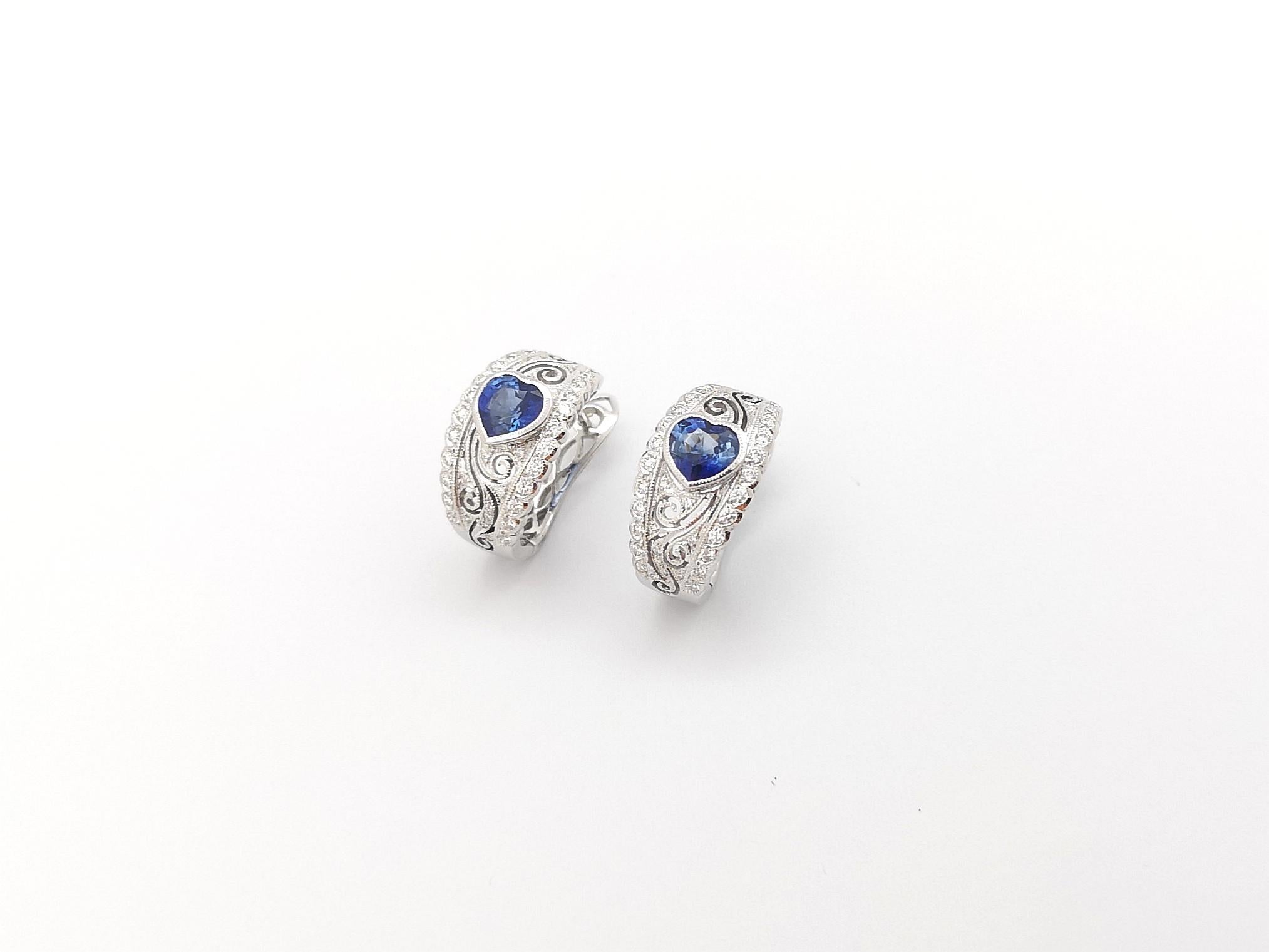 Women's Heart Shape Blue Sapphire with Diamond Earrings set in 18K White Gold Settings For Sale
