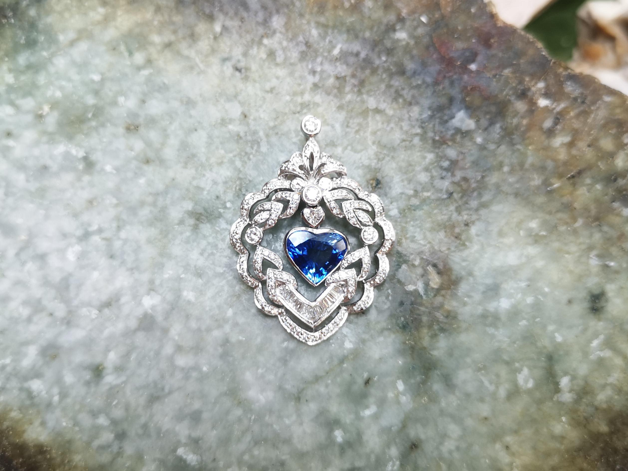 Women's Heart Shape Blue Sapphire with Diamond Pendant Set in 18 Karat White Gold For Sale