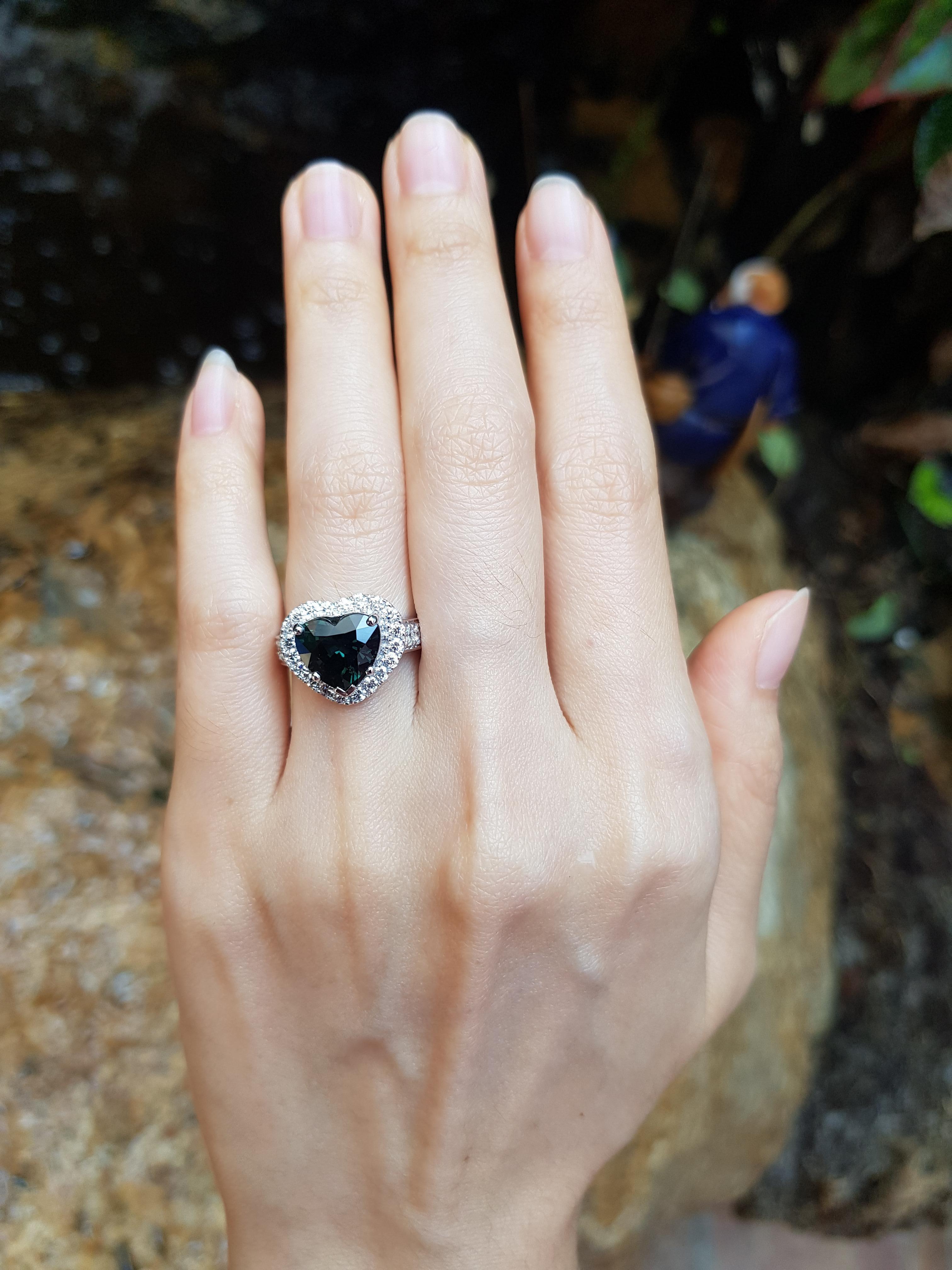 Blue Sapphire 2.40 carats with Diamond 0.40 carat Ring set in 18 Karat White Gold Settings

Width: 1.7 cm
Length: 1.7 cm 
Ring Size: 52

