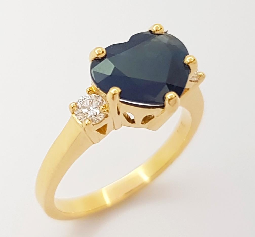 Bague en or 18 carats sertie d'un saphir bleu en forme de cœur avec diamants en vente 5