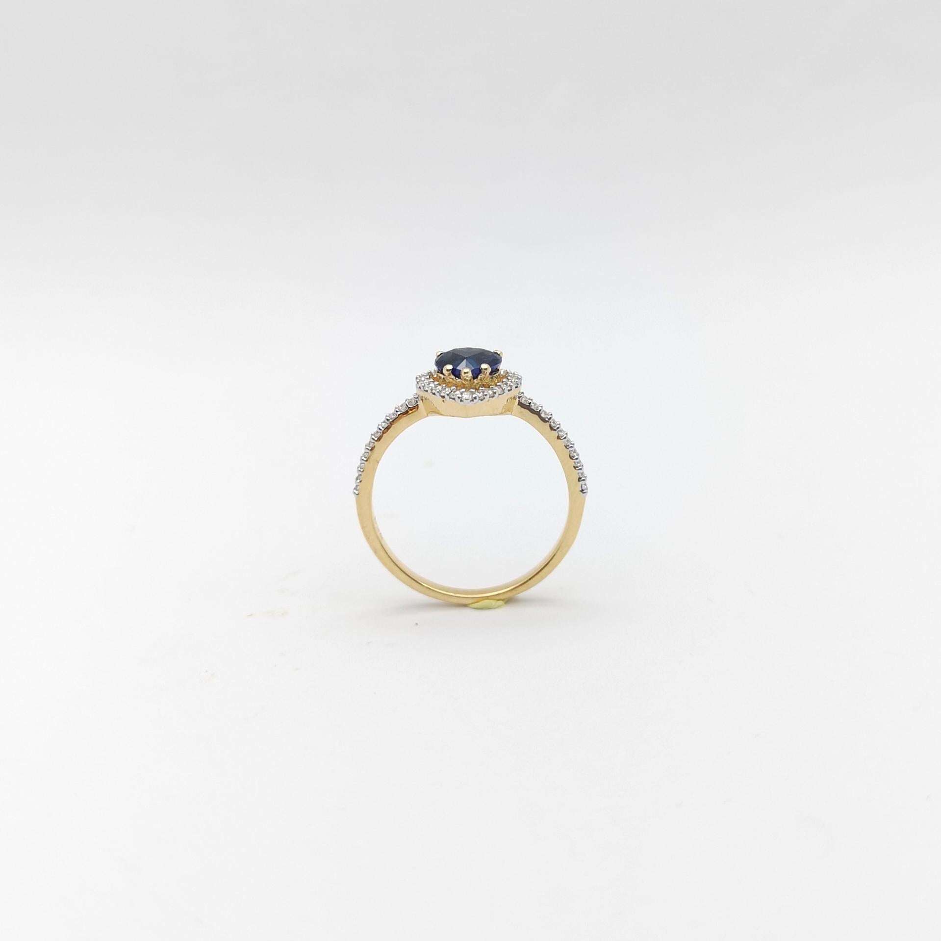 Bague en or 18 carats sertie d'un saphir bleu en forme de cœur avec diamants en vente 6