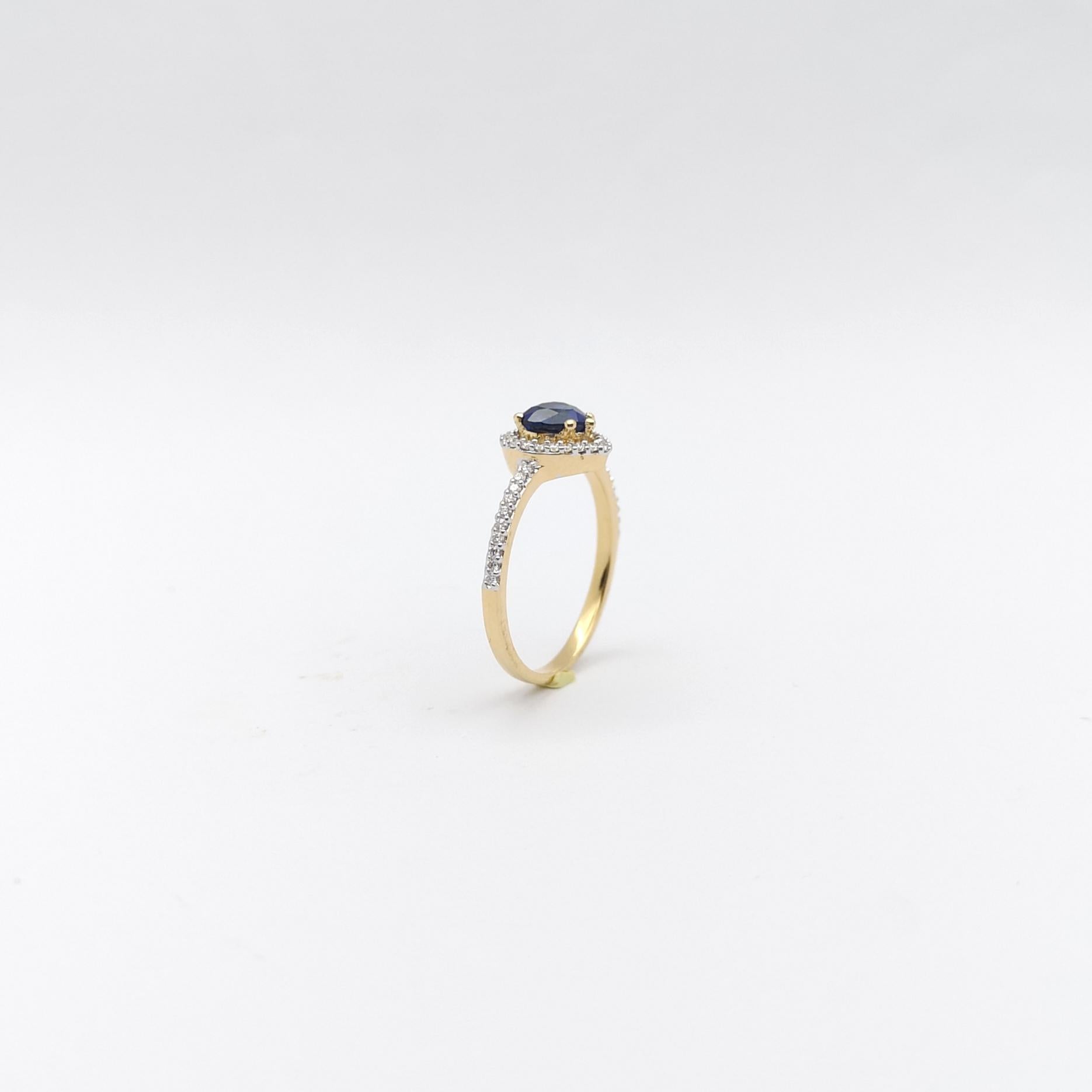 Bague en or 18 carats sertie d'un saphir bleu en forme de cœur avec diamants en vente 9