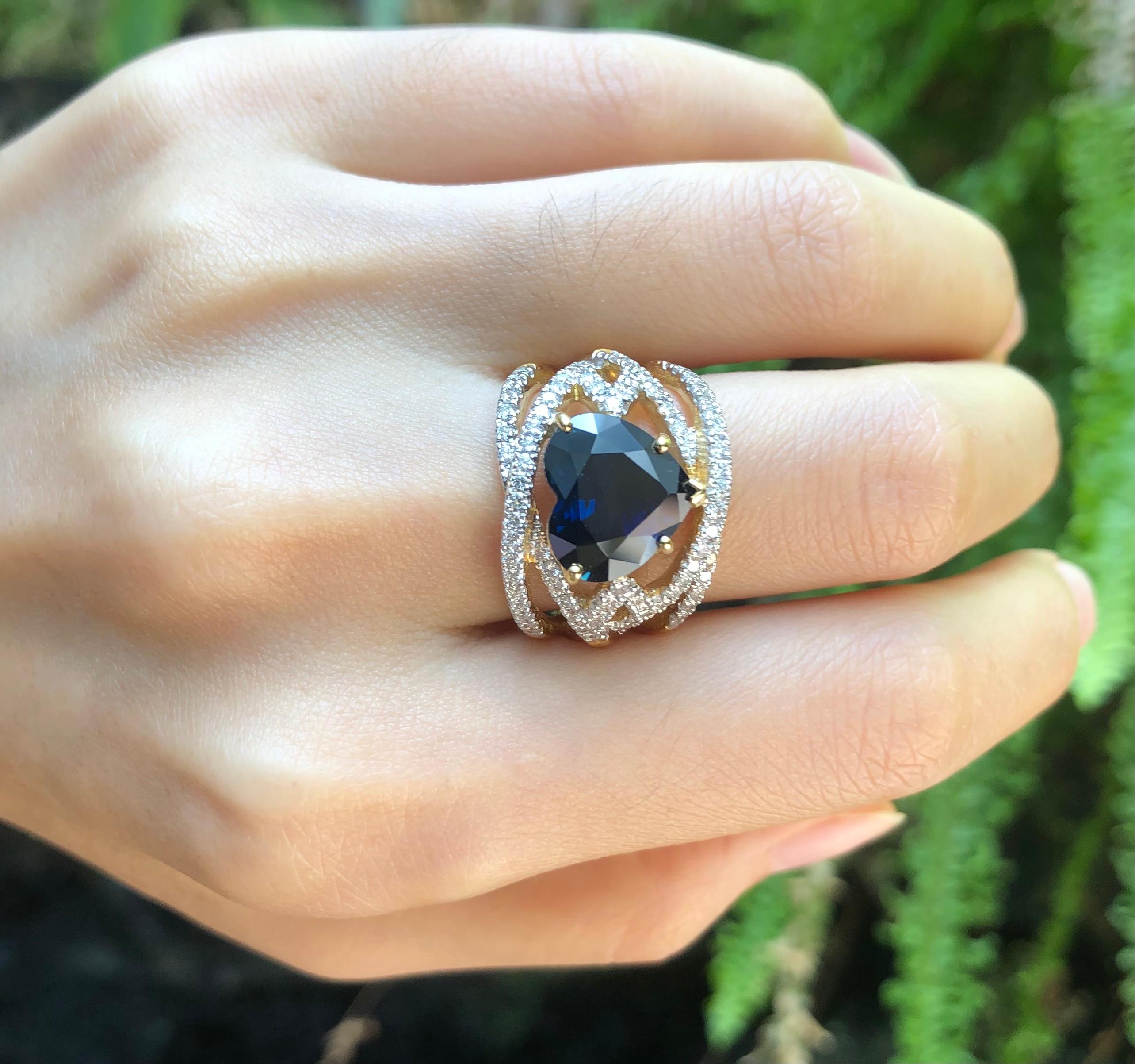 Blue Sapphire 5.64 carats with Diamond 0.82 carat Ring set in 18 Karat Gold Settings

Width:  1.1 cm 
Length: 1.1 cm
Ring Size: 52
Total Weight: 13.01 grams

