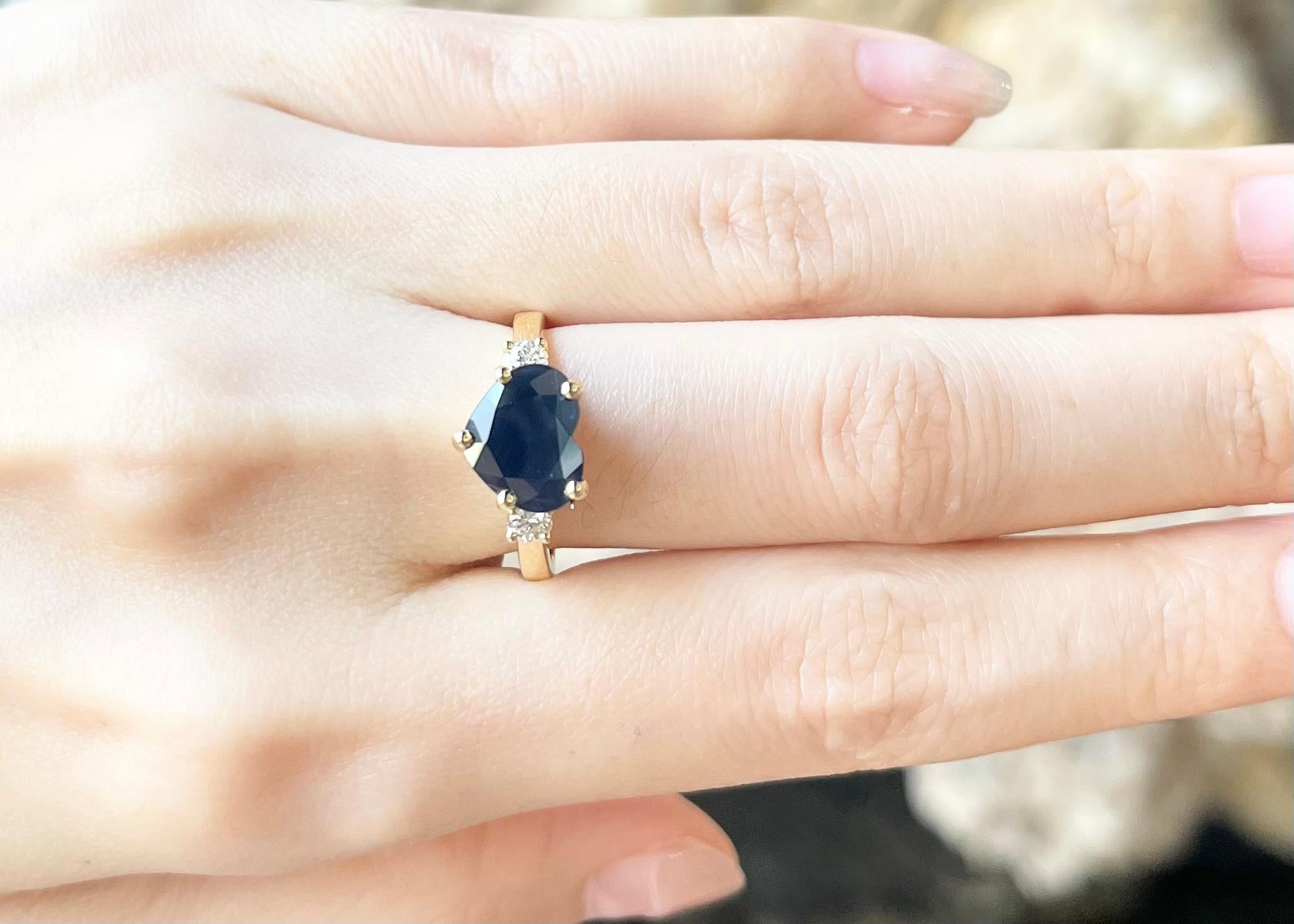 Contemporary Heart Shape Blue Sapphire with Diamond Ring set in 18K Gold Settings For Sale
