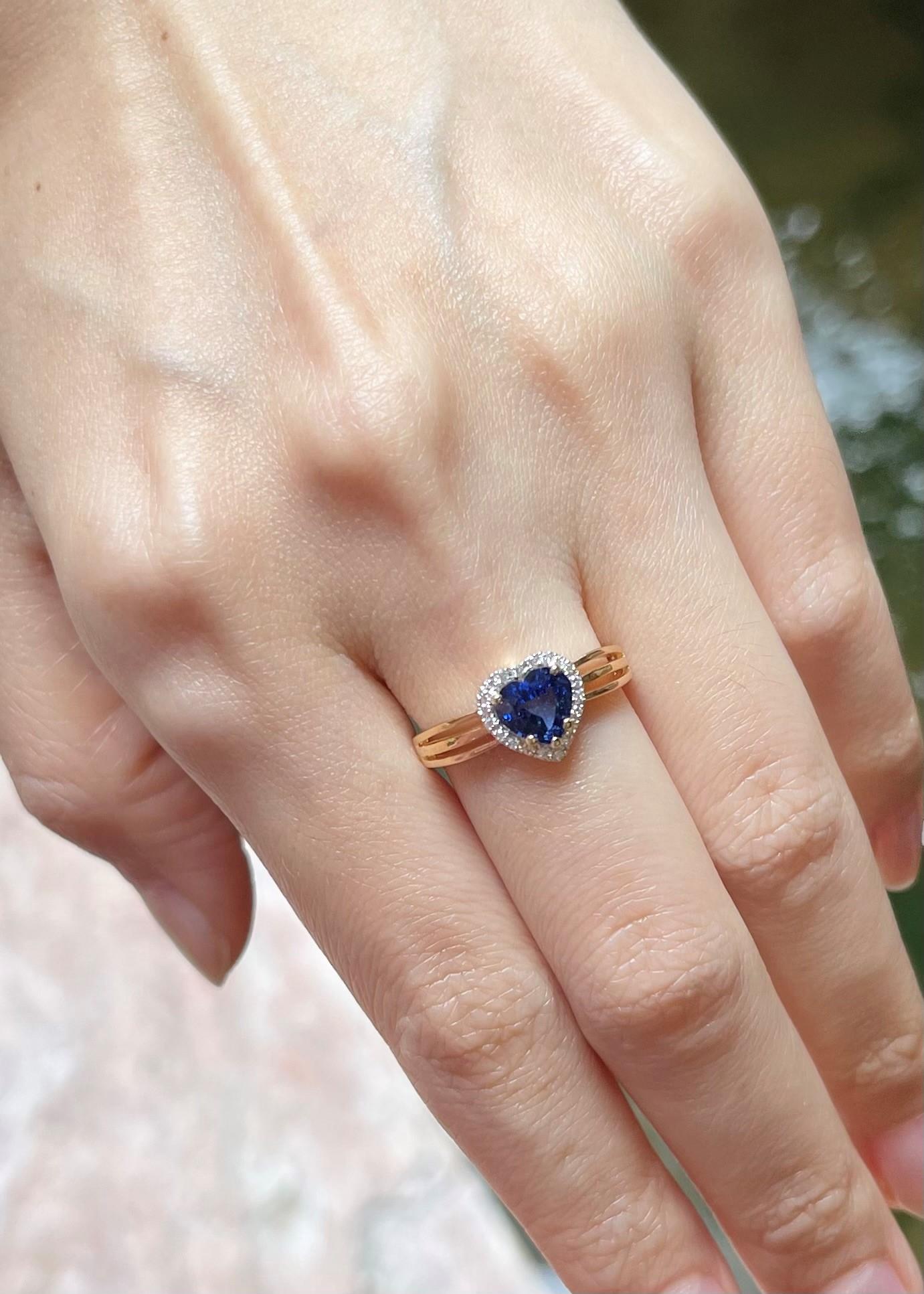 Contemporary Heart Shape Blue Sapphire with Diamond Ring set in 18K Gold Settings For Sale