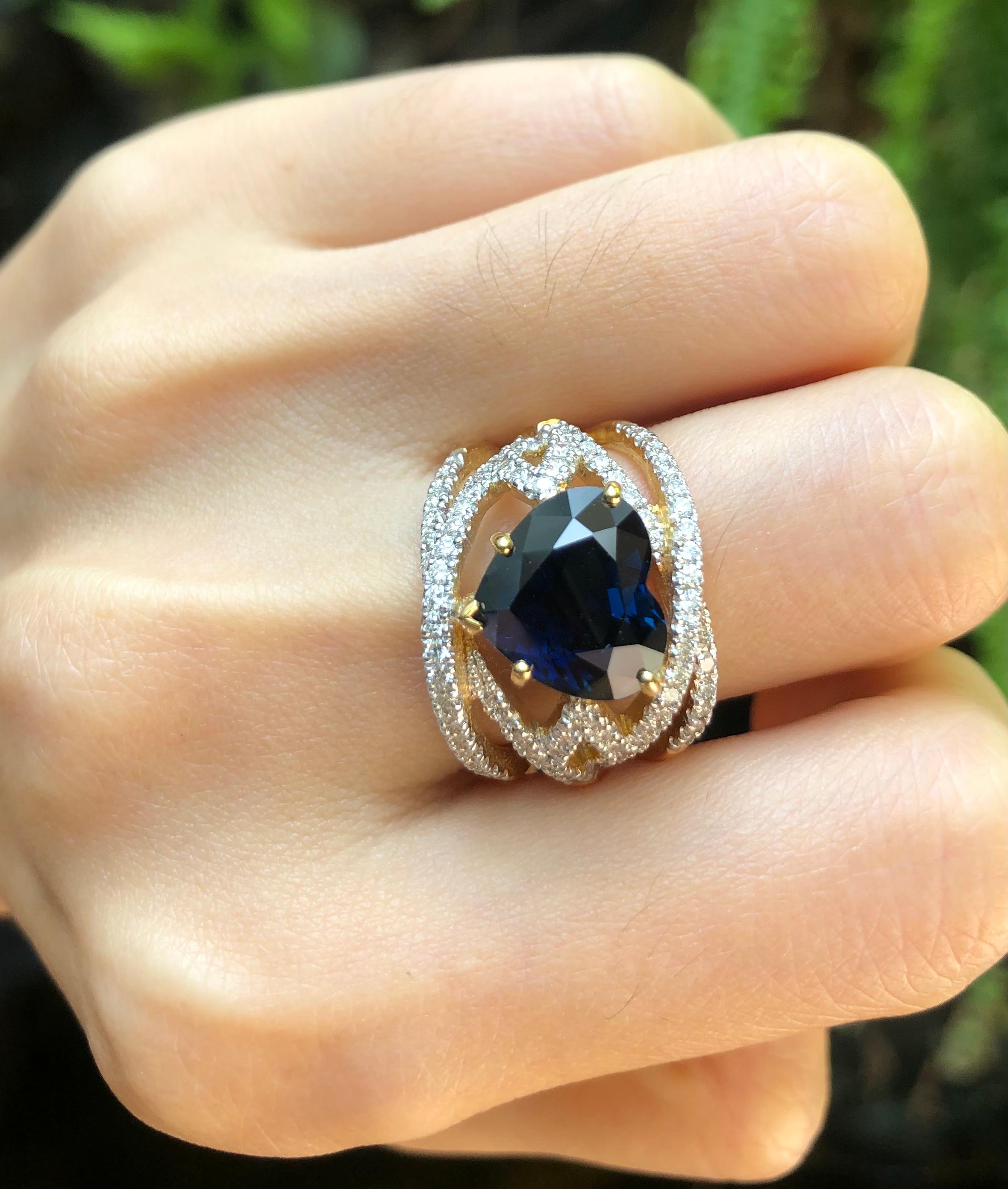 Contemporary Heart Shape Blue Sapphire with Diamond Ring Set in 18k Gold Settings For Sale