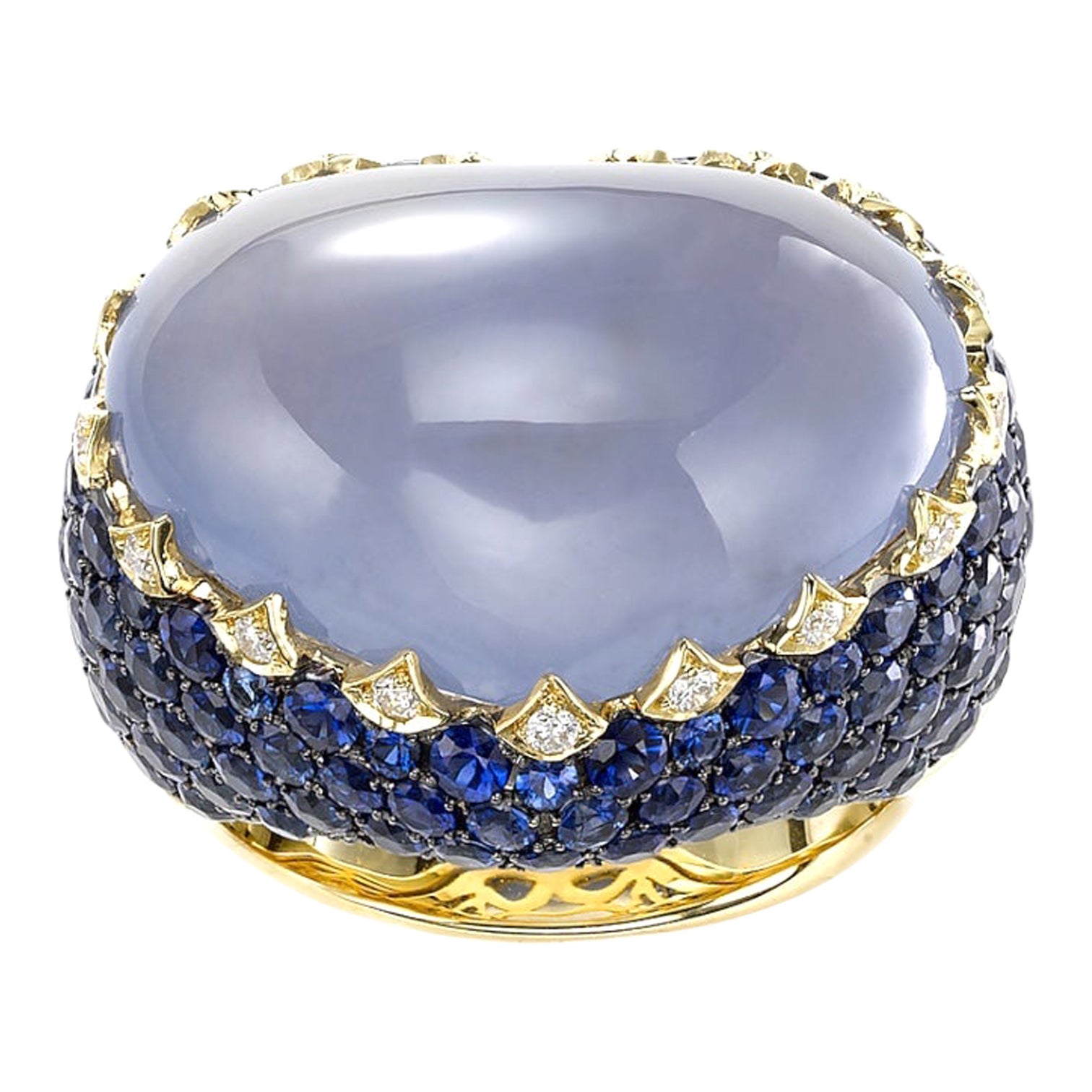 Anillo de oro amarillo de 18k con cabujón de calcedonia y zafiro en forma de corazón