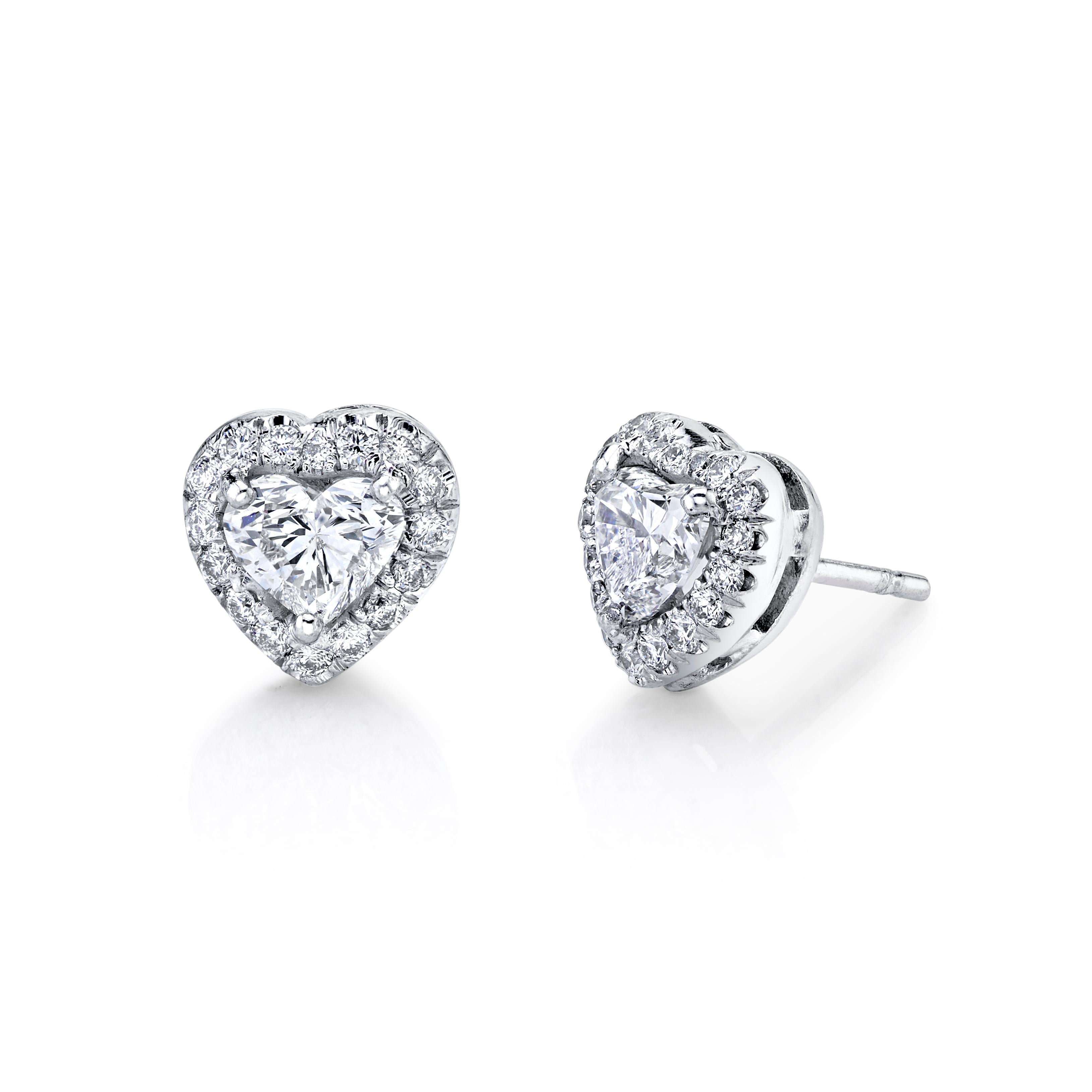 Heart Shape Diamond Earrings and Pendant Set 2.79 carats Platinum/18KWG

Spectacular. Set in Platinum/18KWG

EARRINGS:

Heart Shape weighs 0.50 carats 

F Color VS2 Clarity GIA Certificate #5336840706

Heart Shape weighs 0.54 carats 

E Color VS2