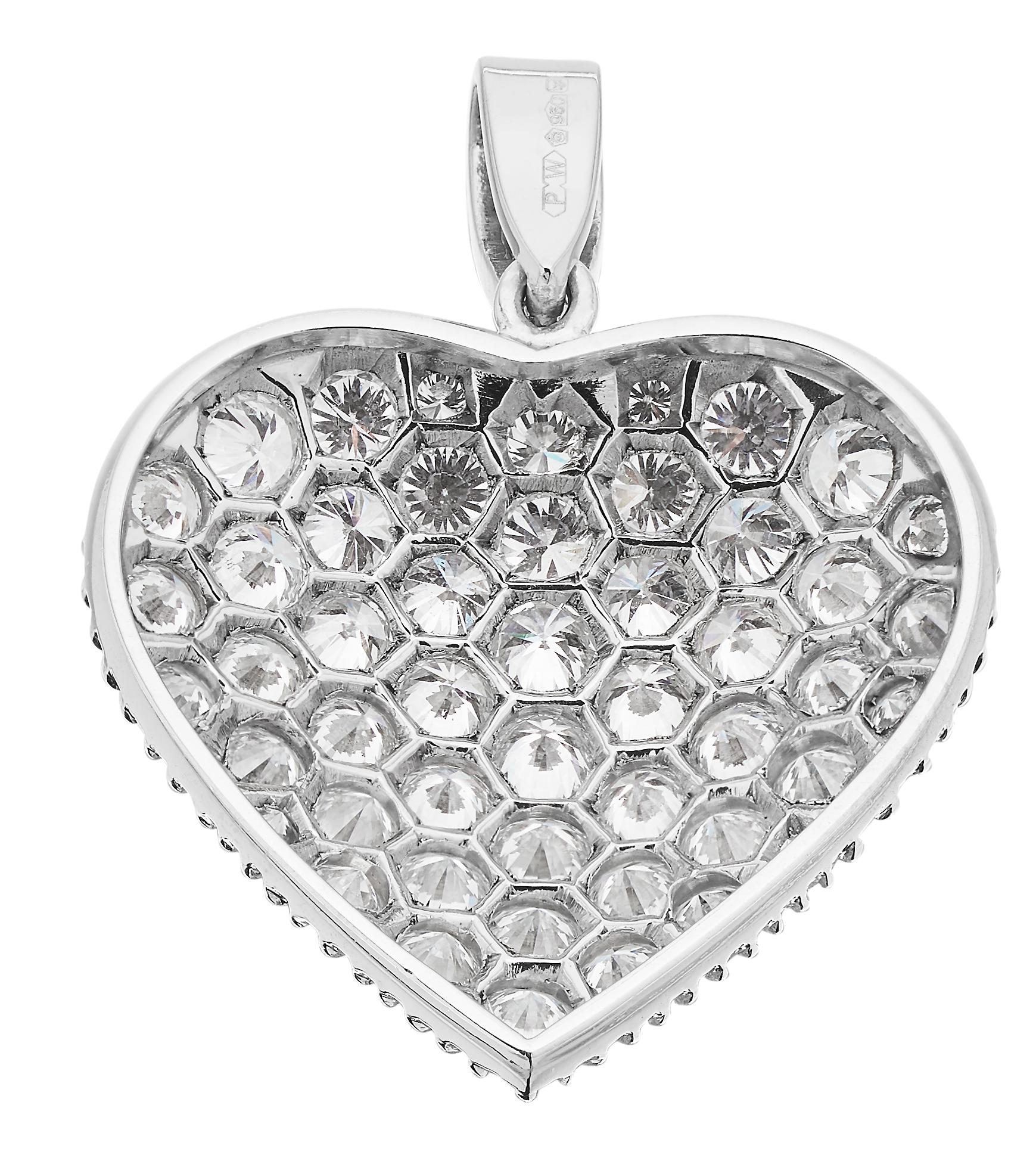 Beautiful diamond heart pendant set with glistening round brilliant diamonds on a platinum with textured edge. 
British hallmarked platinum 950, London, sponsor mark 