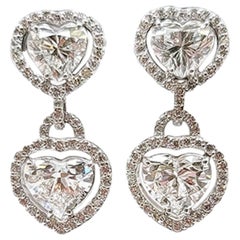 Pendants d'oreilles en forme de cœur avec diamants